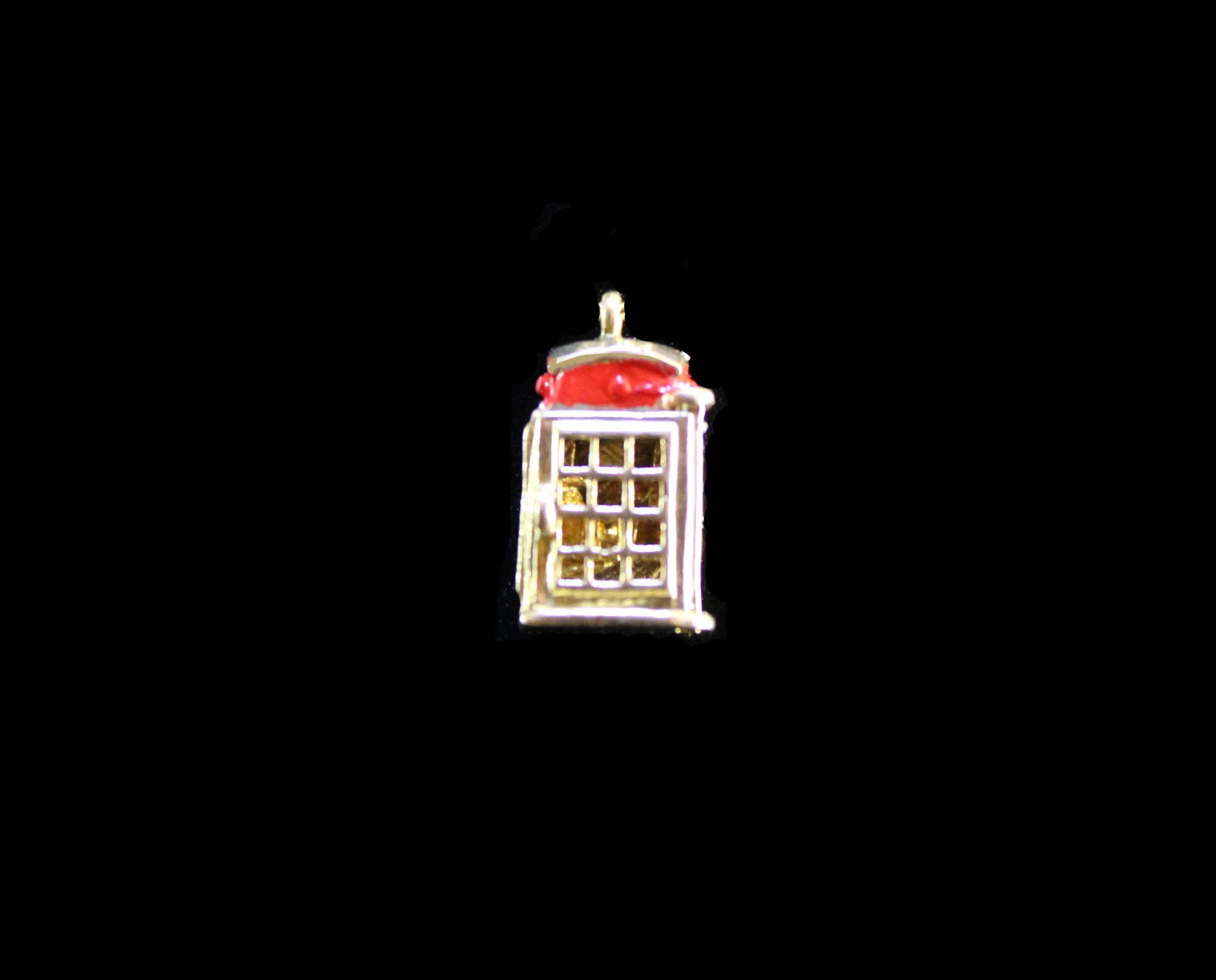 Antique gold telephone booth charm with red enamel