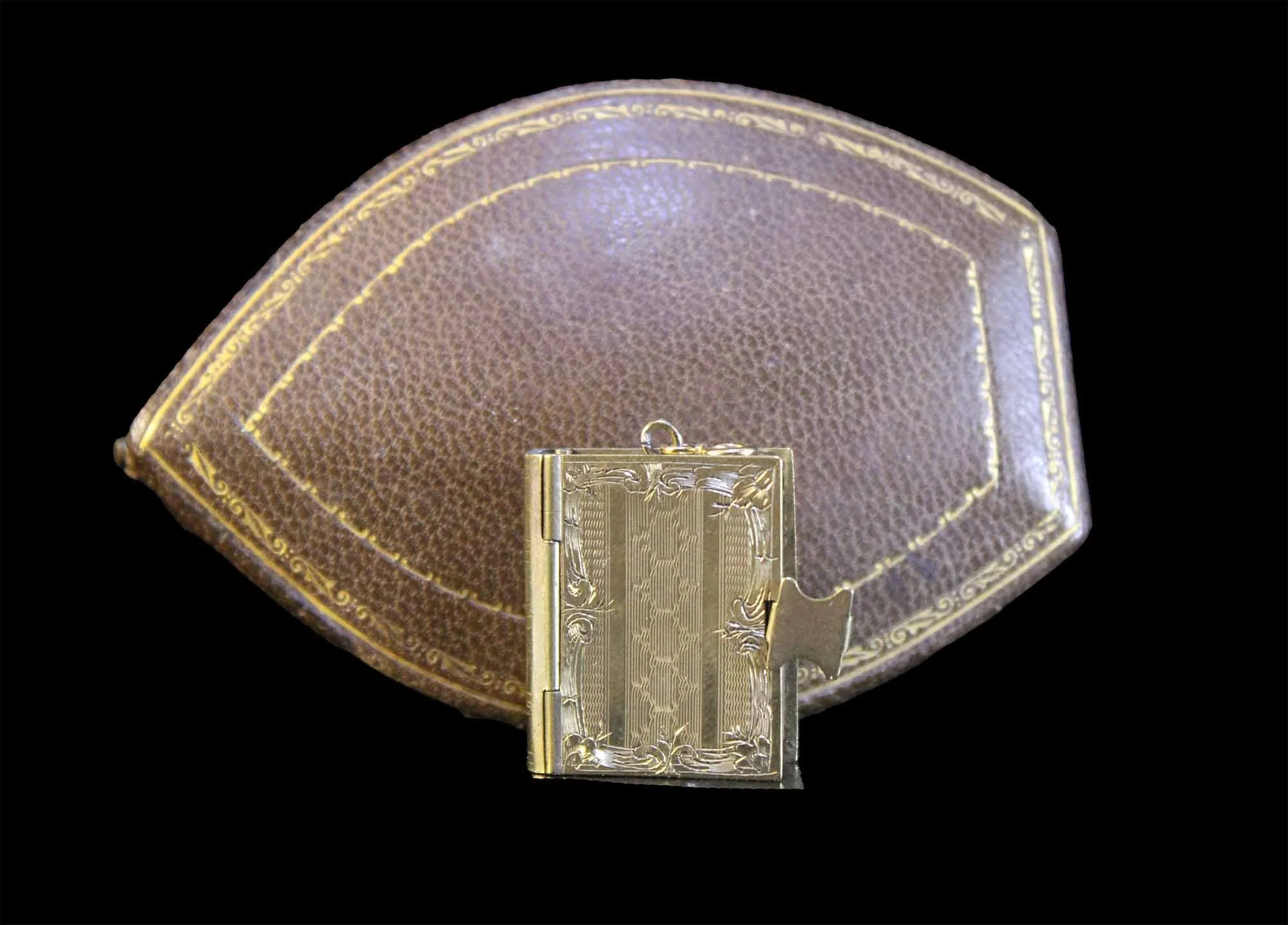 Front view of book locket with Victorian presentation case.