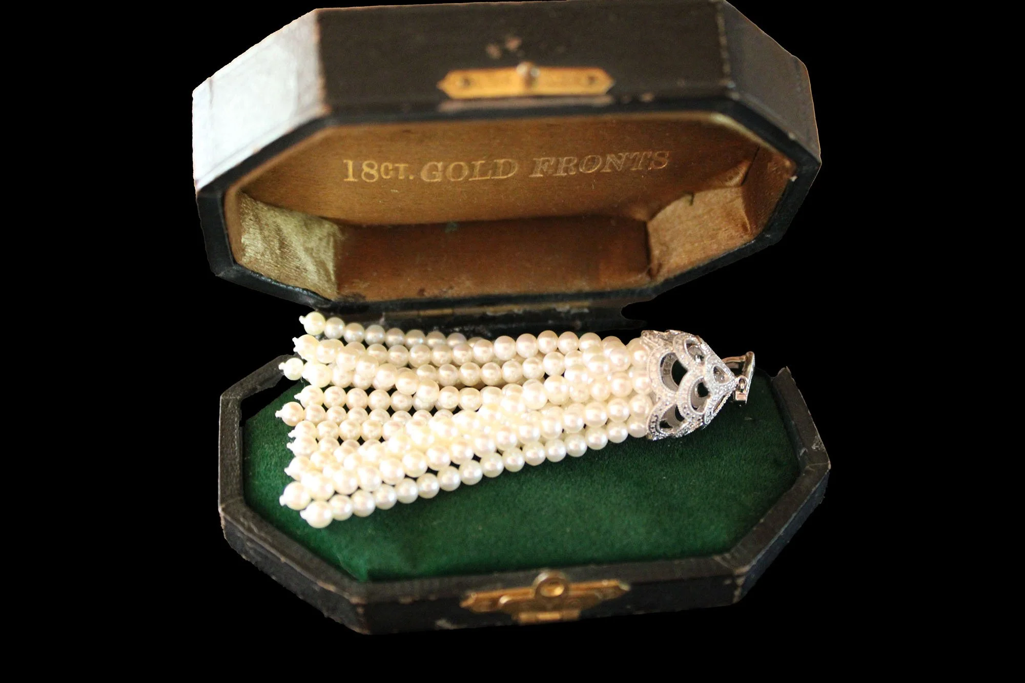 open jewelry case with 18ct gold diamond and cultured pearl tassel pendant with pierced diamond-set cap