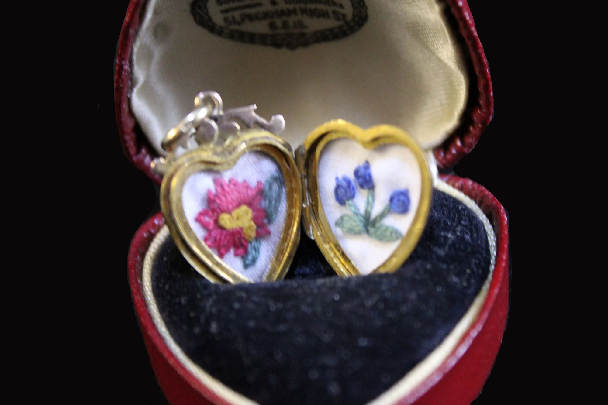 close-up hand embroidery in antique jewelry presentation case..jpg