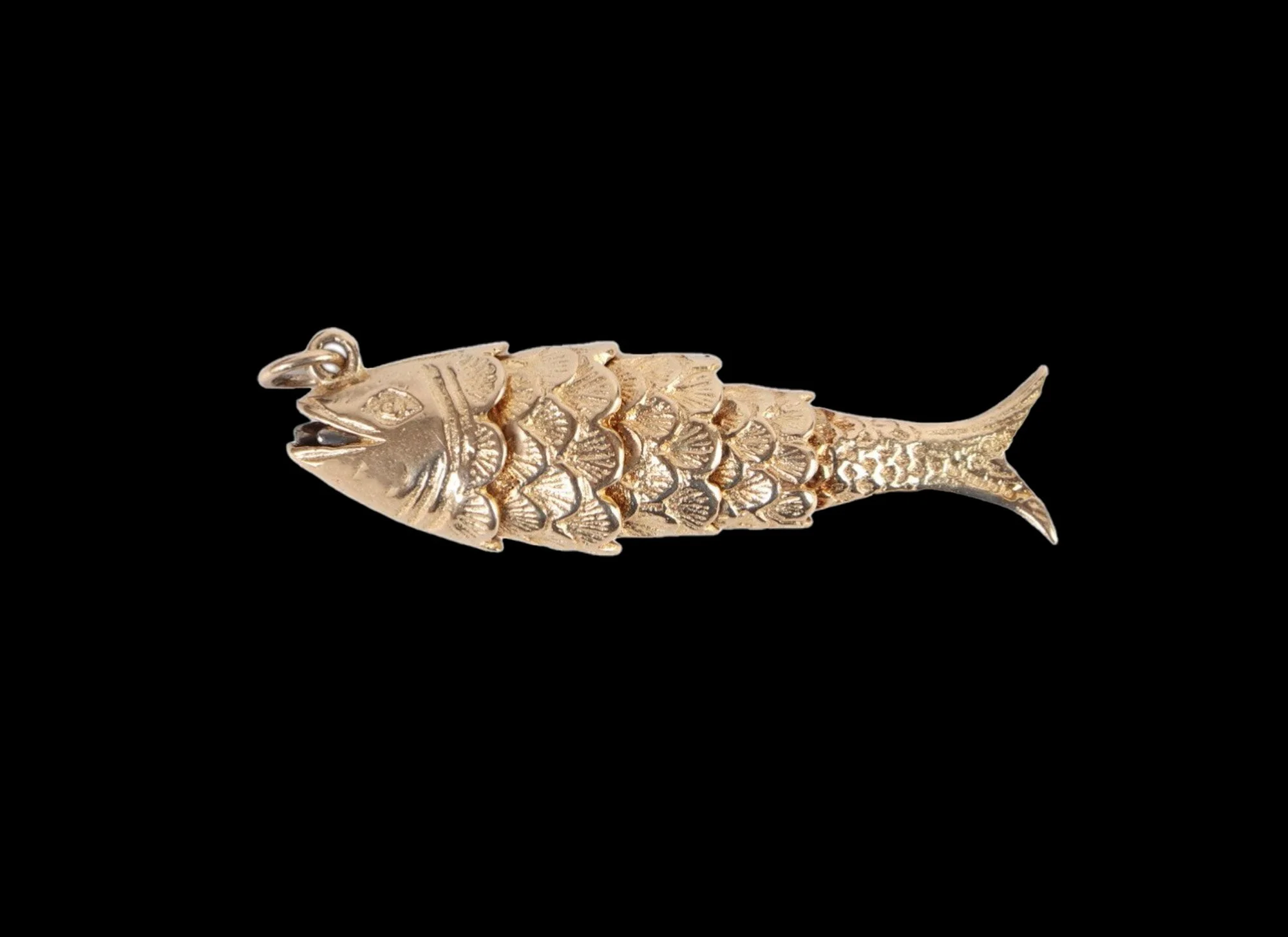Victorian gold articulated fish pendant side view with detailed scales