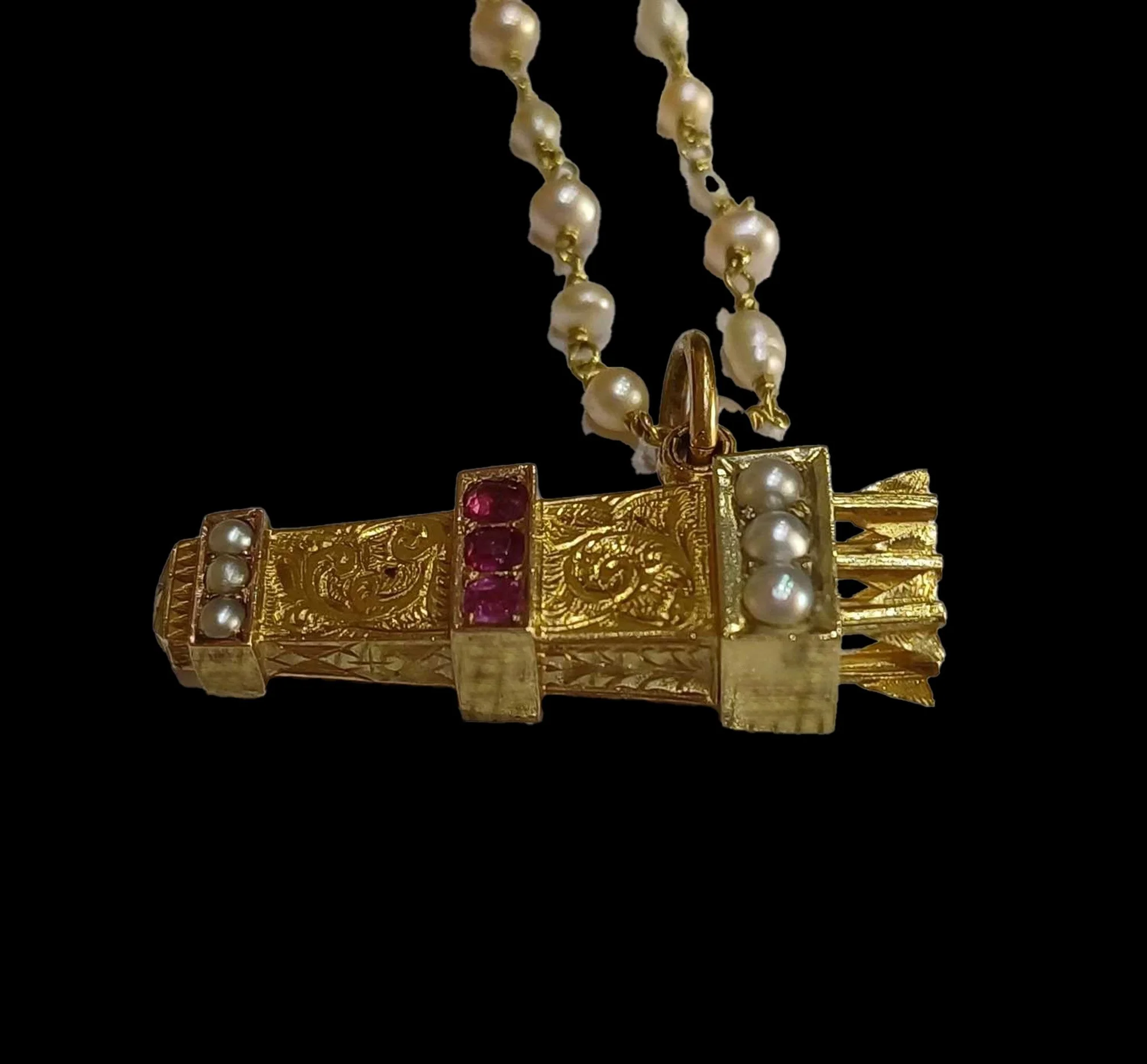 Antique gold quiver pendant set with rubies and split pearls