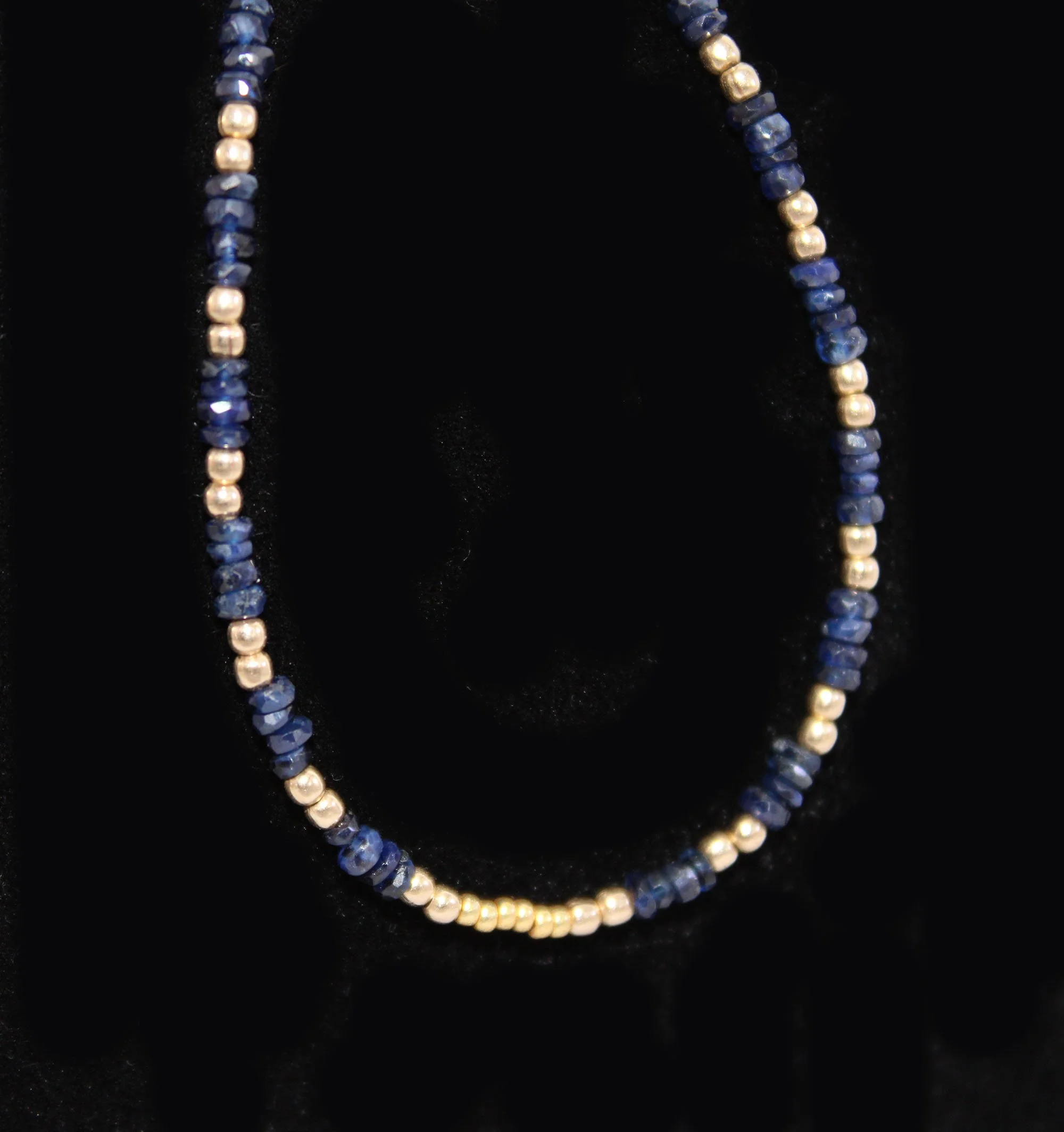Bracelet of faceted Midnight blue Burma beads