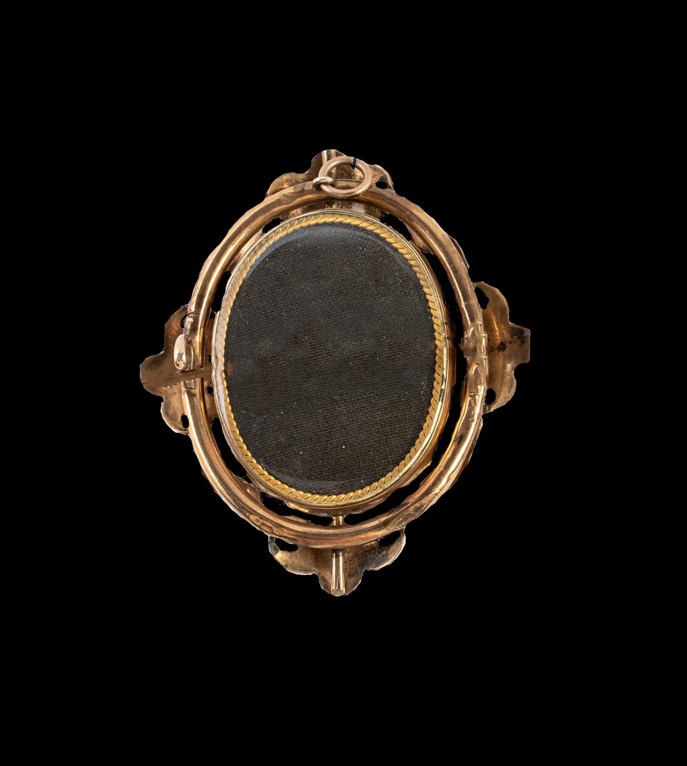 Reverse view of Victorian hairwork locket with original backing and bale