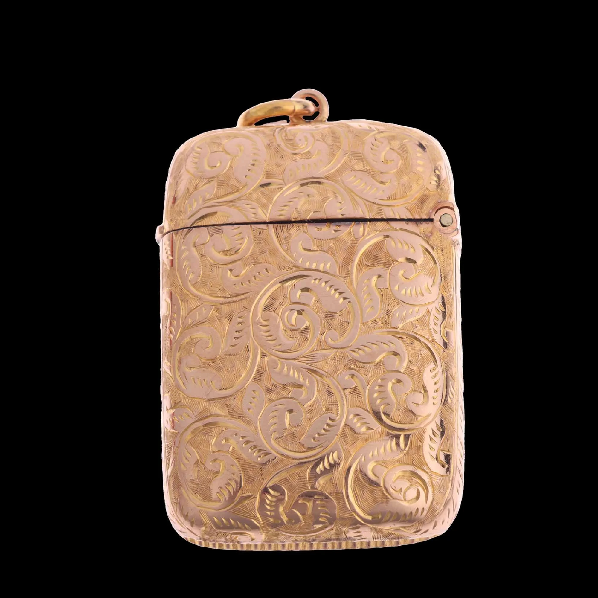 Reverse of antique Victorian gold vesta case showing continuous engraved scrollwork.