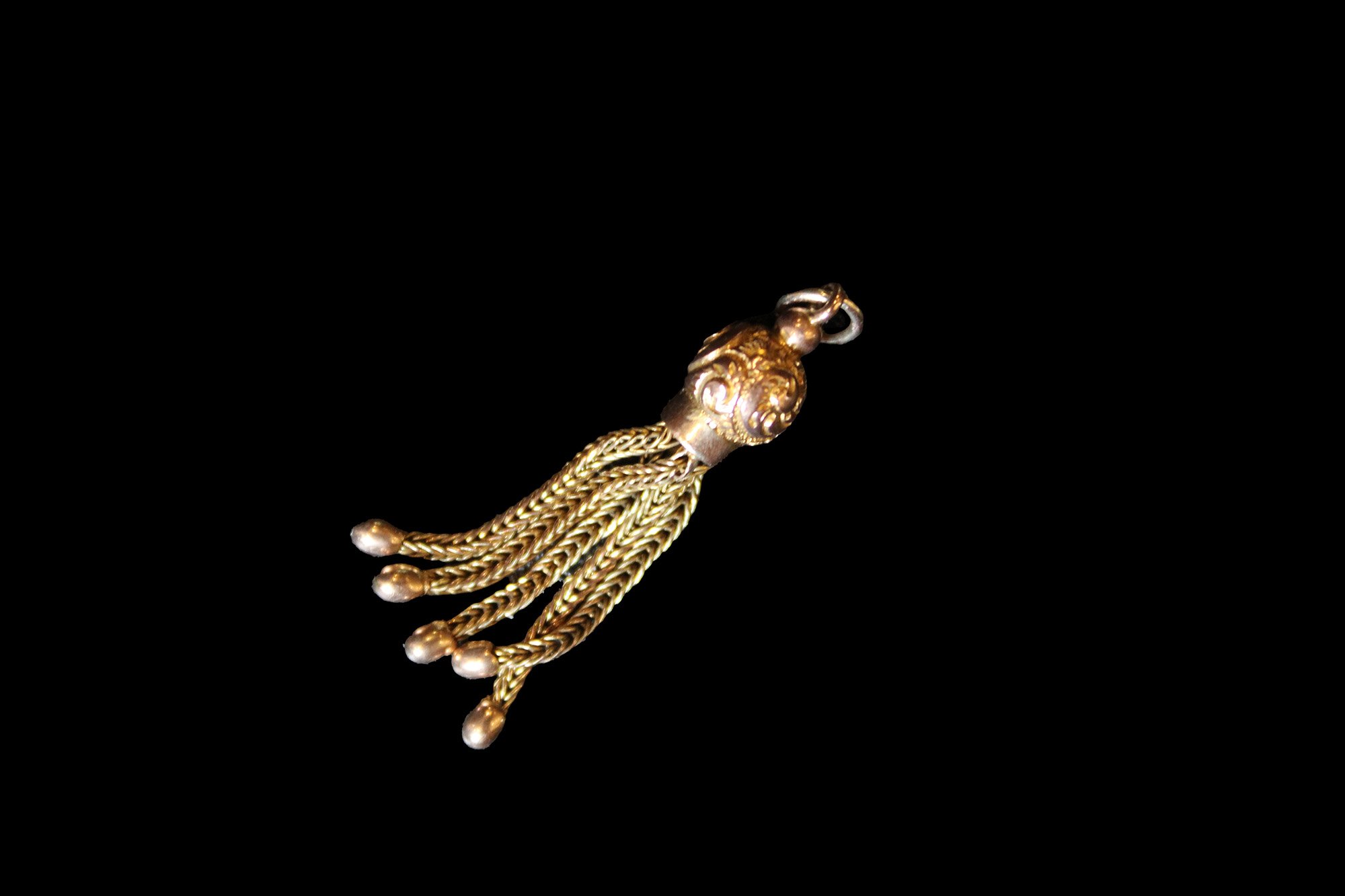 Victorian 9K rose gold tassel pendant with articulated braided gold strands and ornate cap