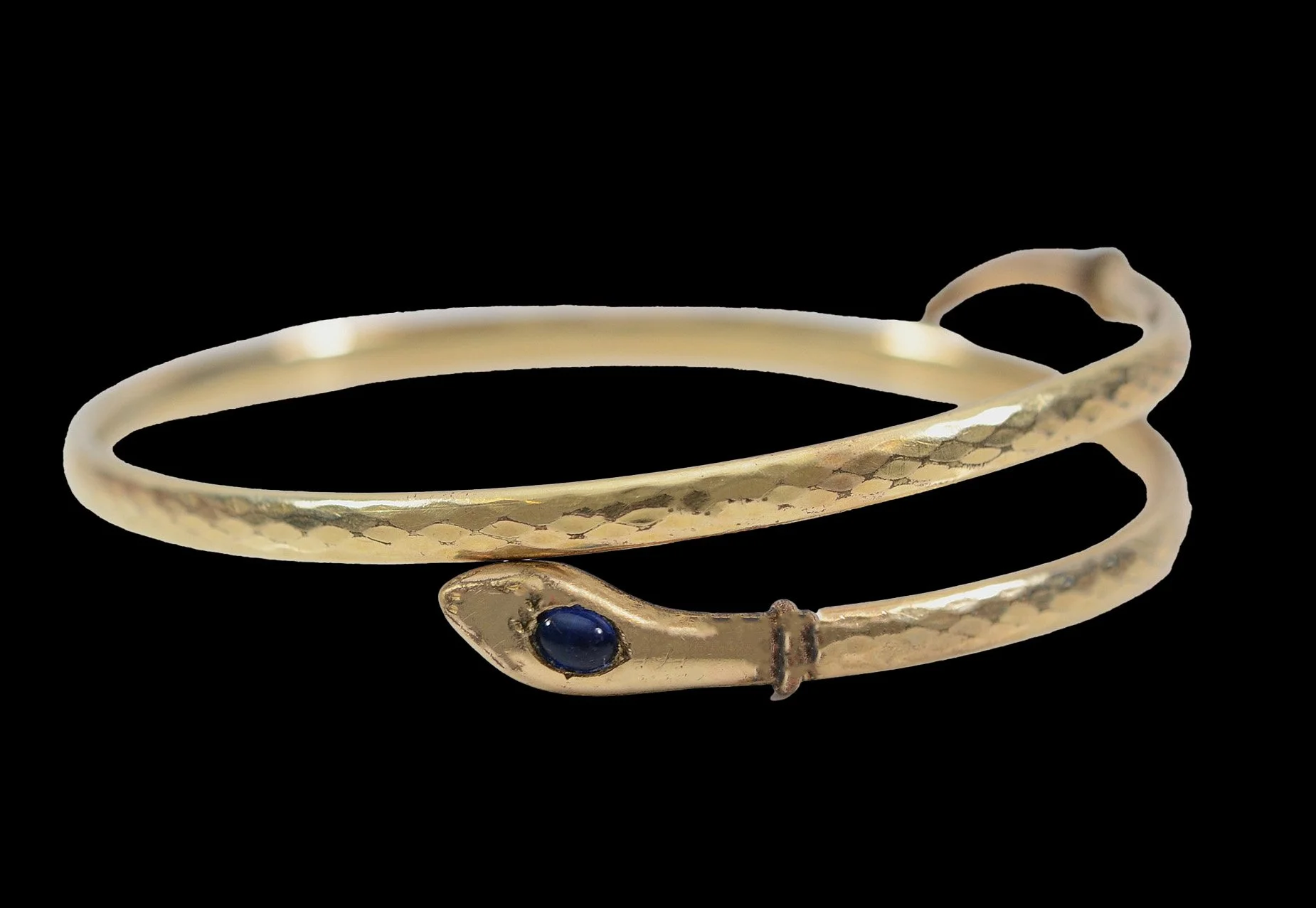 Victorian 9ct gold expandable snake bangle with hammered finish and blue cabochon gemstone eyes.
