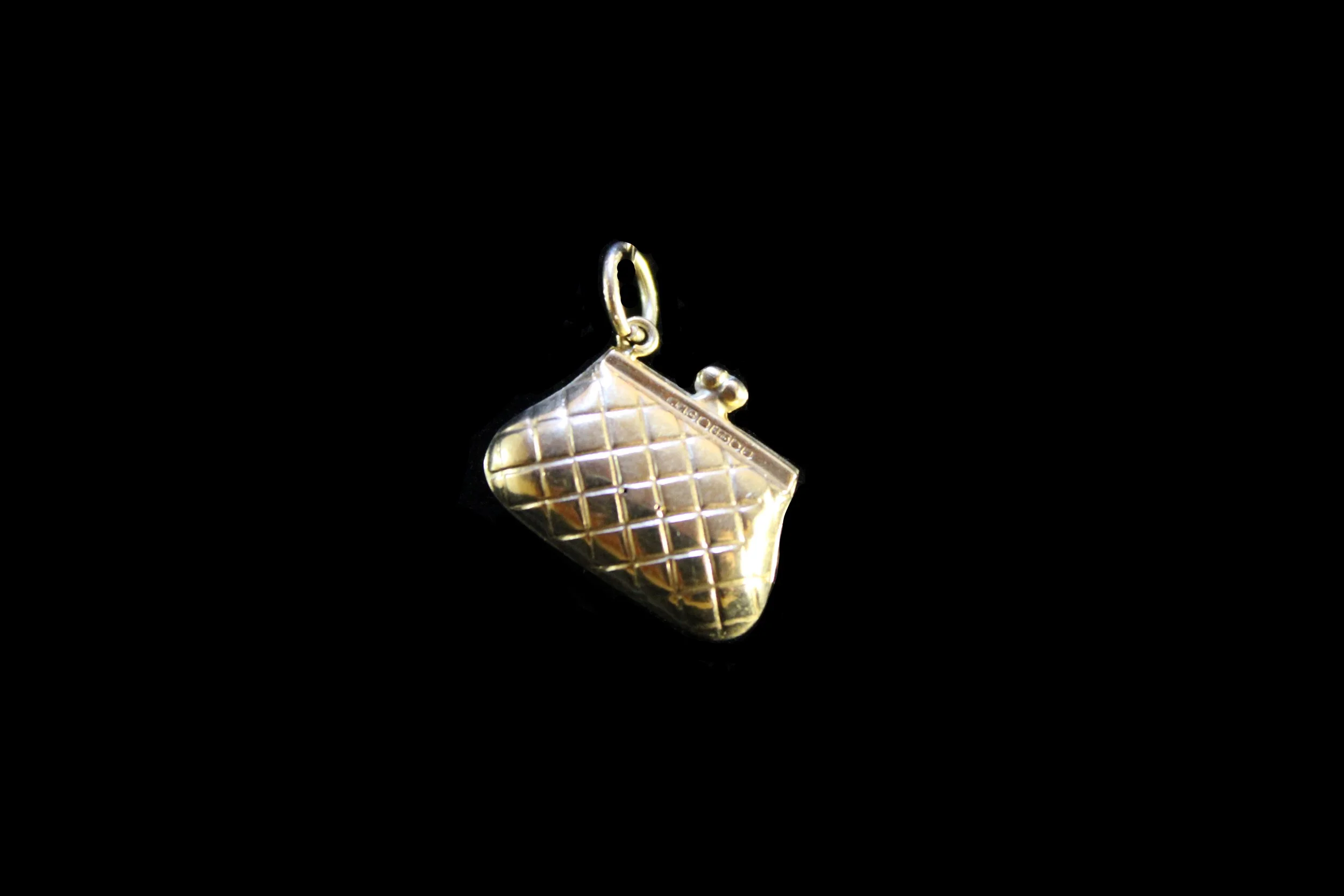 Antique gold handbag charm with quilted pattern