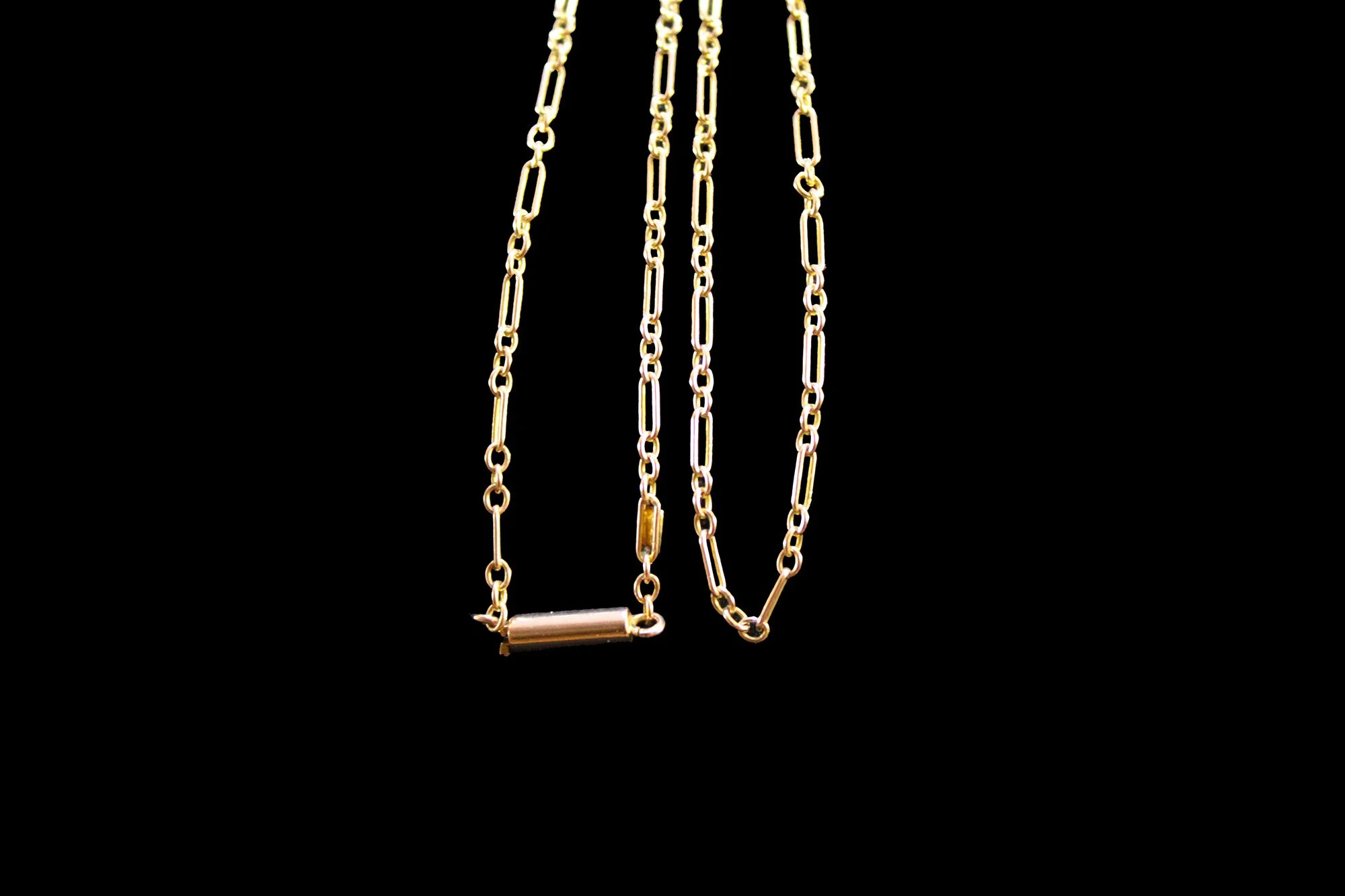 close up Victorian Barrel Clasp on Figaro link chain