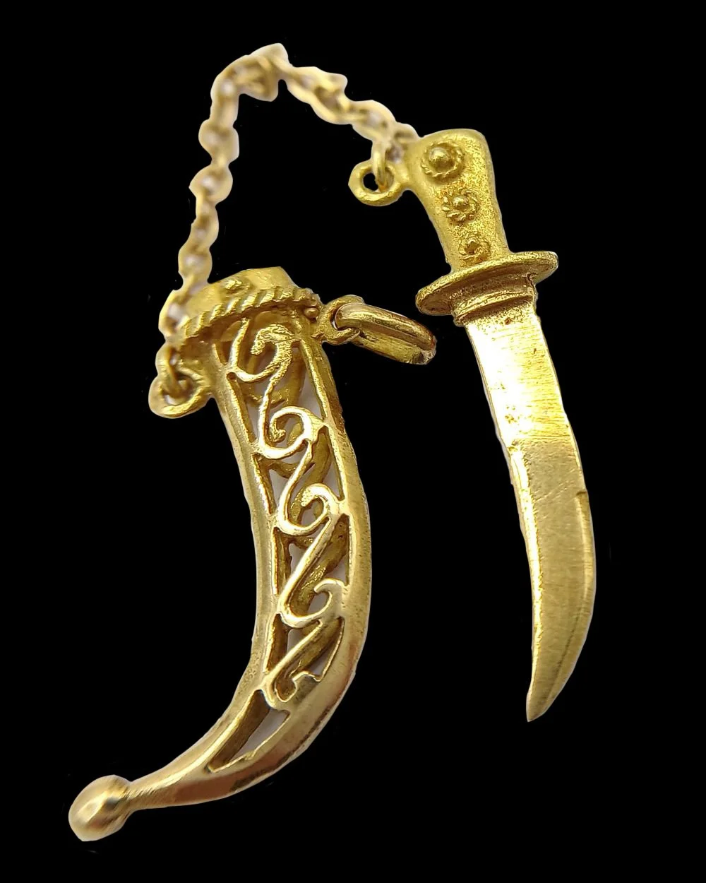 Antique gold dagger and scabbard pendant