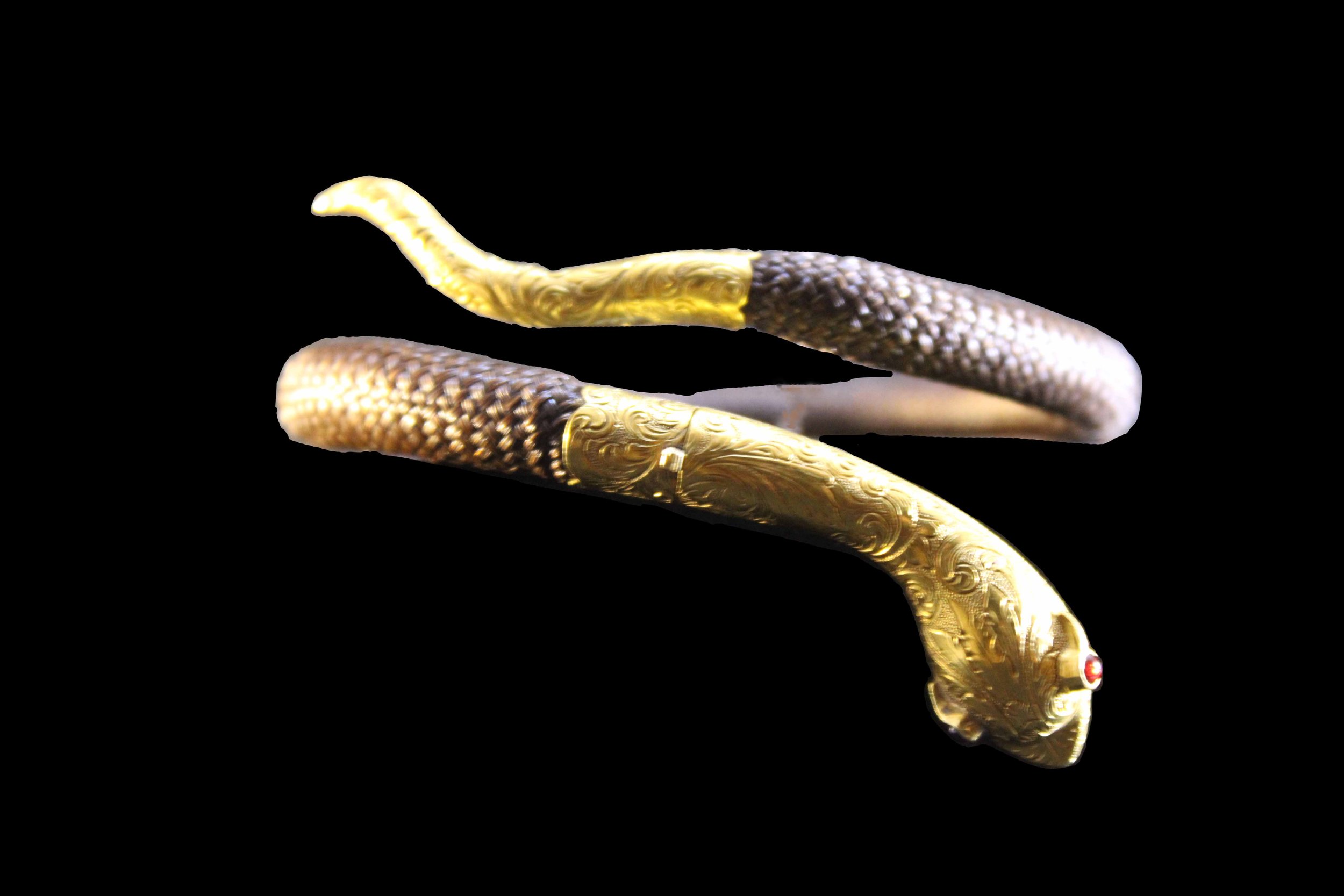 Extended view of antique serpent bracelet with flexible human hairwork body