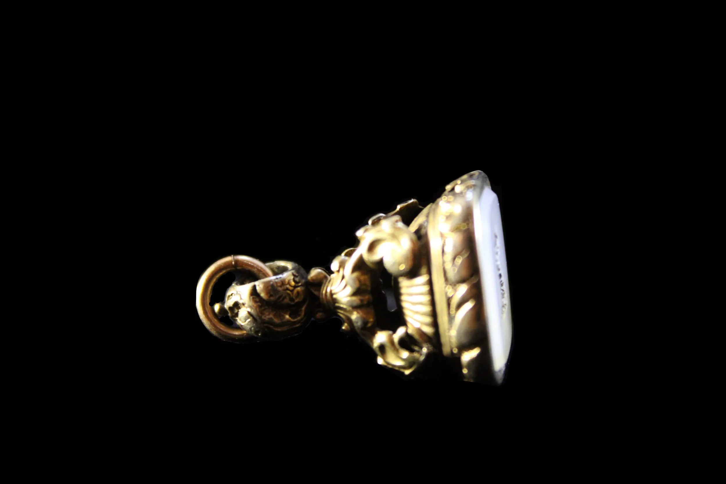 Victorian personal seal with sea serpent heraldic motif carved in chalcedony