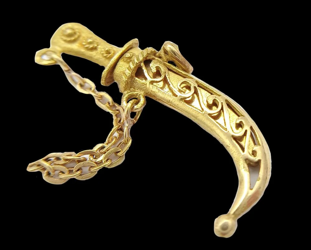 Victorian symbolic dagger pendant with chain