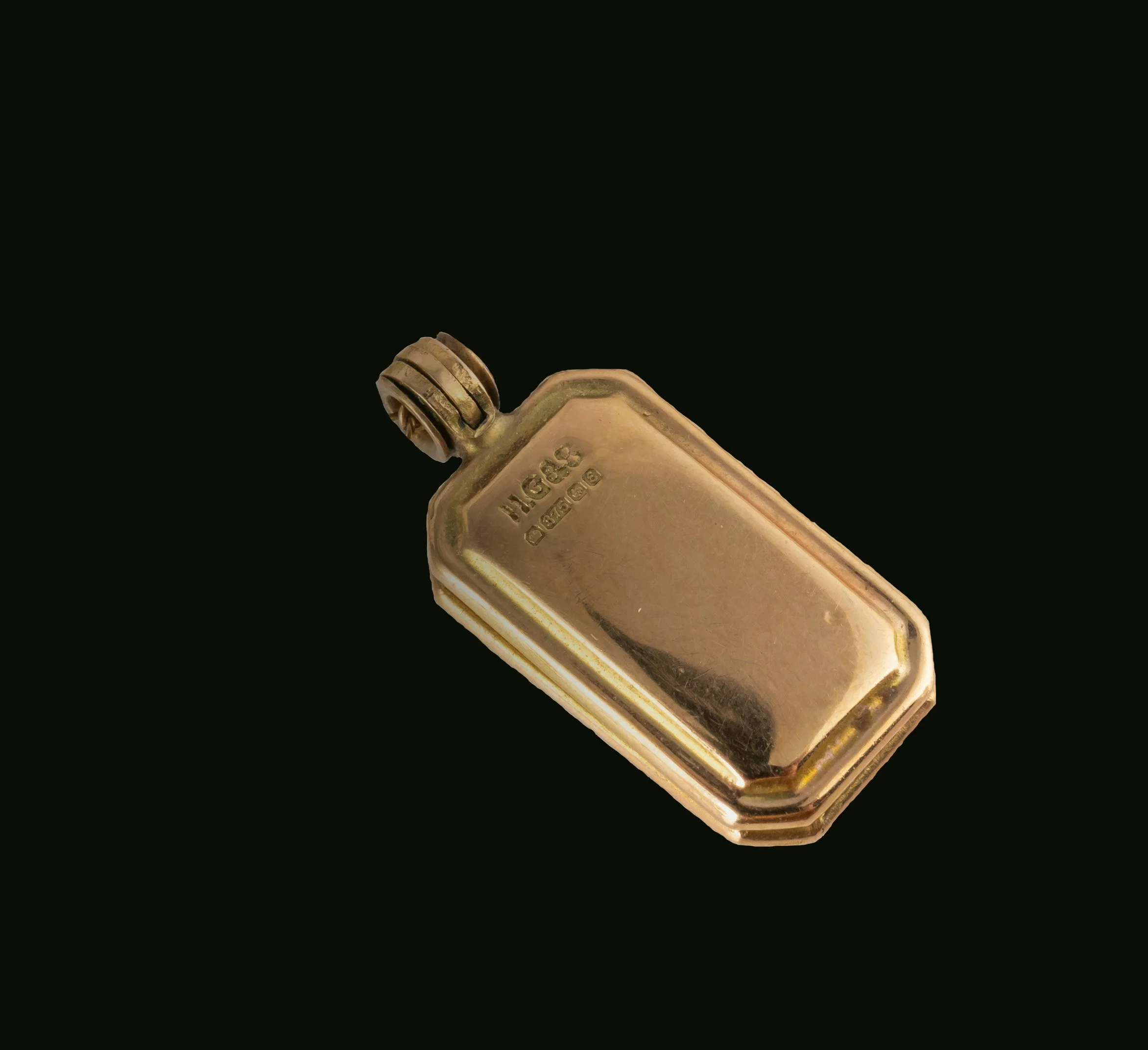 Back view of antique 9K gold rectangular locket with hallmark stamp