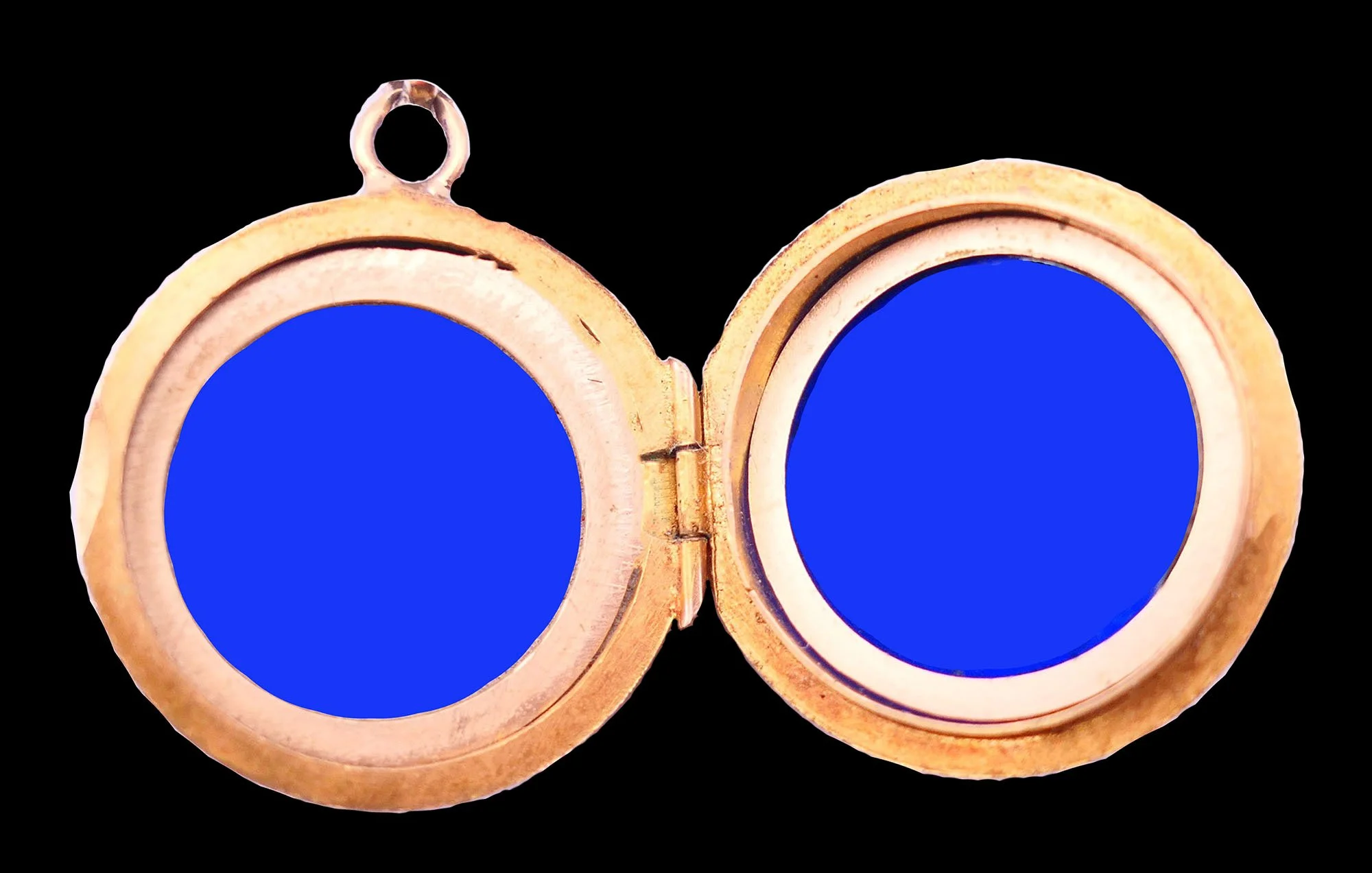 Victorian gold orb locket opened showing two circular photograph compartments