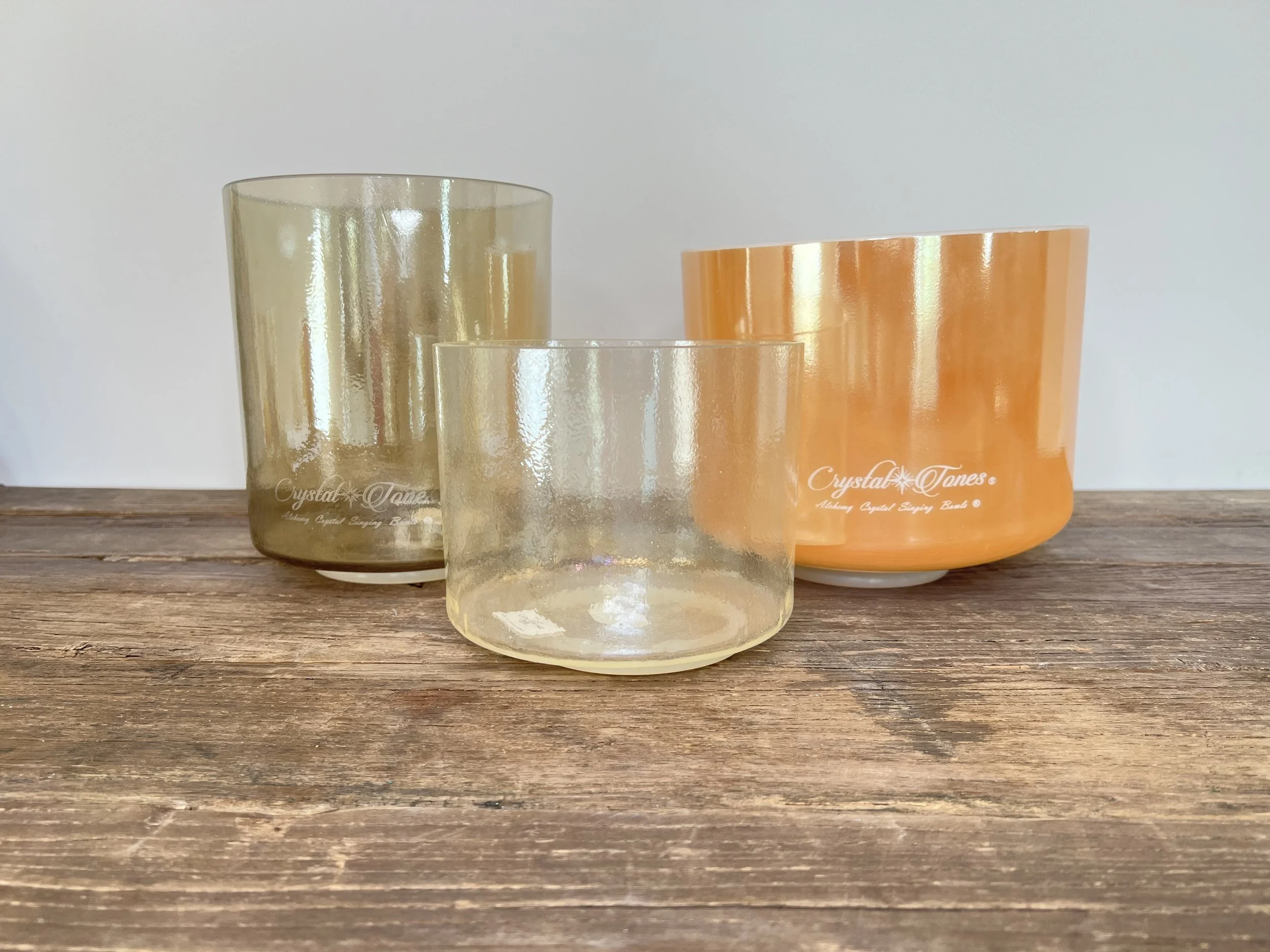 three crystal tones bowls