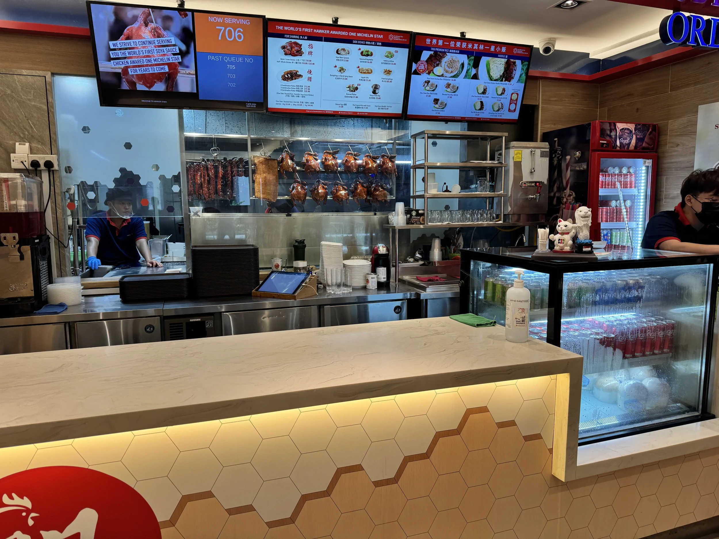  I love the delicious looking chickens hanging on the rack! 