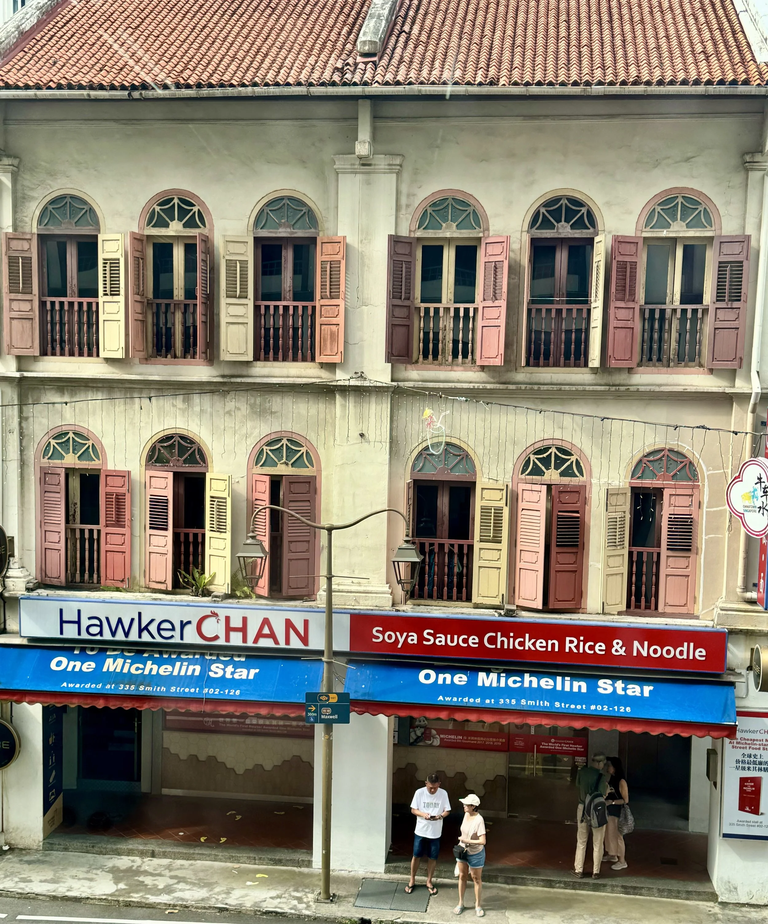  I snapped this photo from across the street. Hawker Chan’s is on the bottom floor of this building. 