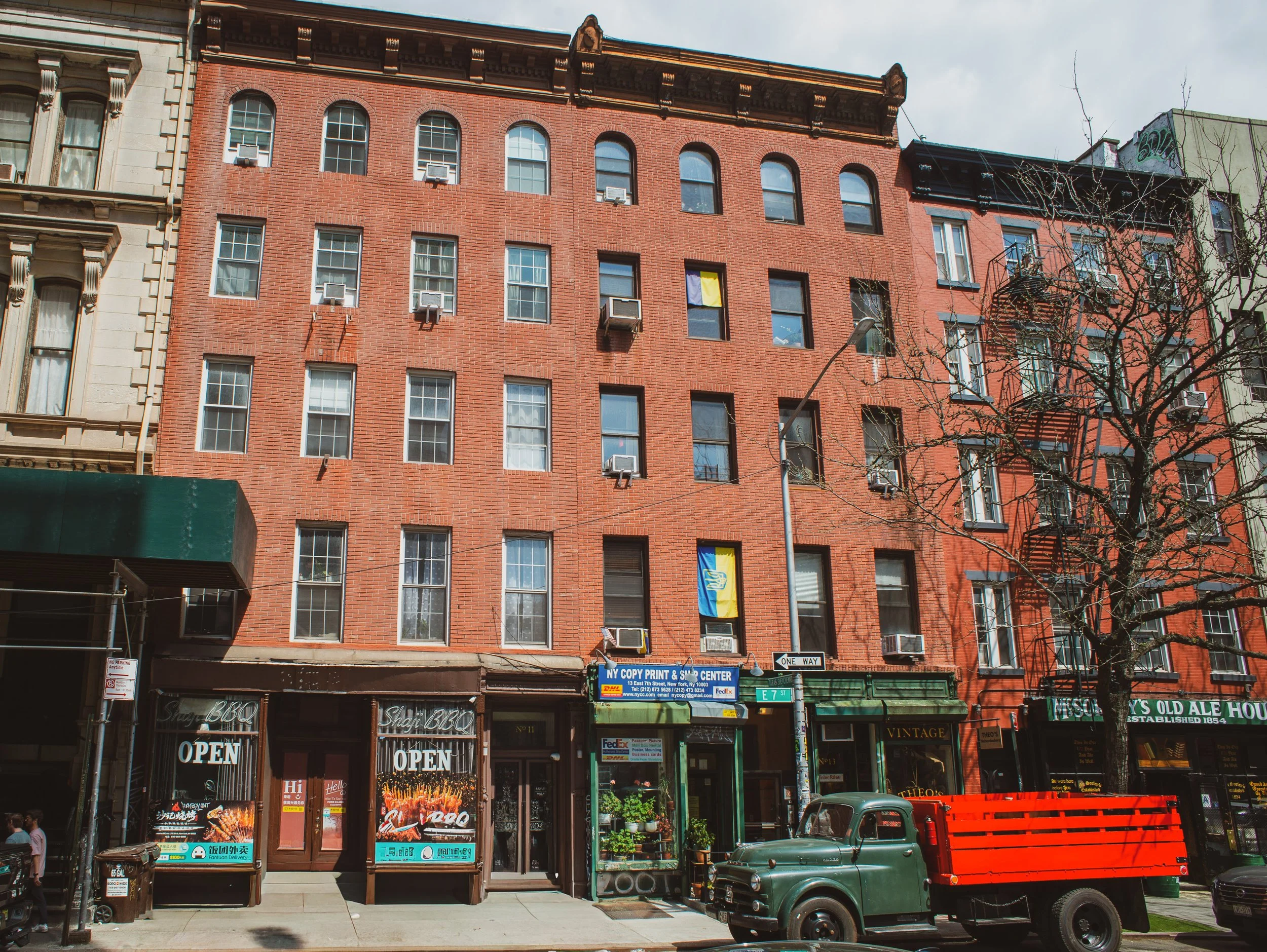 11 East 7th Street, photographed in 2026. This building housed the Chogye International Zen Center from 1978 to 1979. McSorley's Old Ale House awning is visible at the far right.