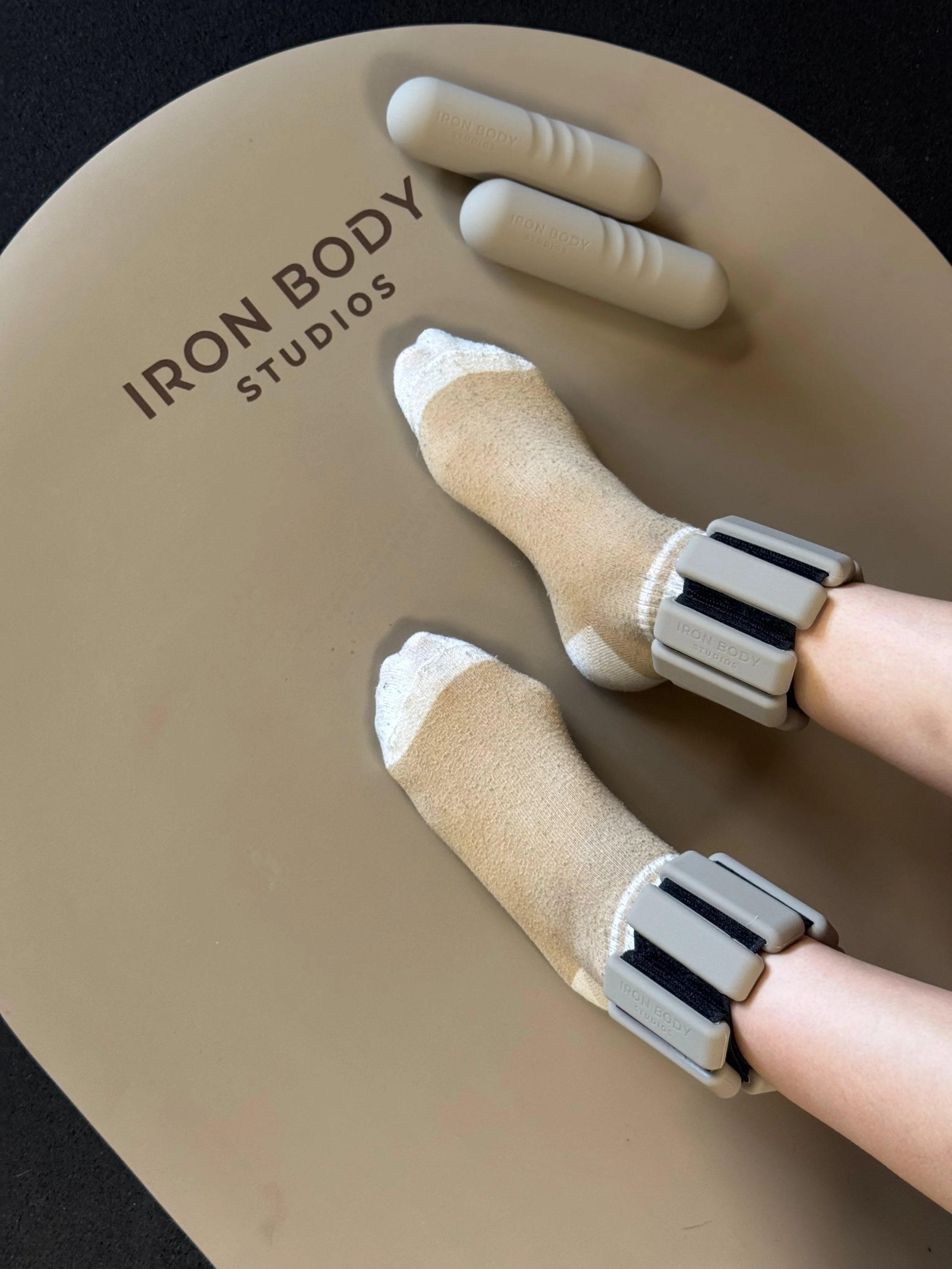 IronBody branded Pilates mat and weights