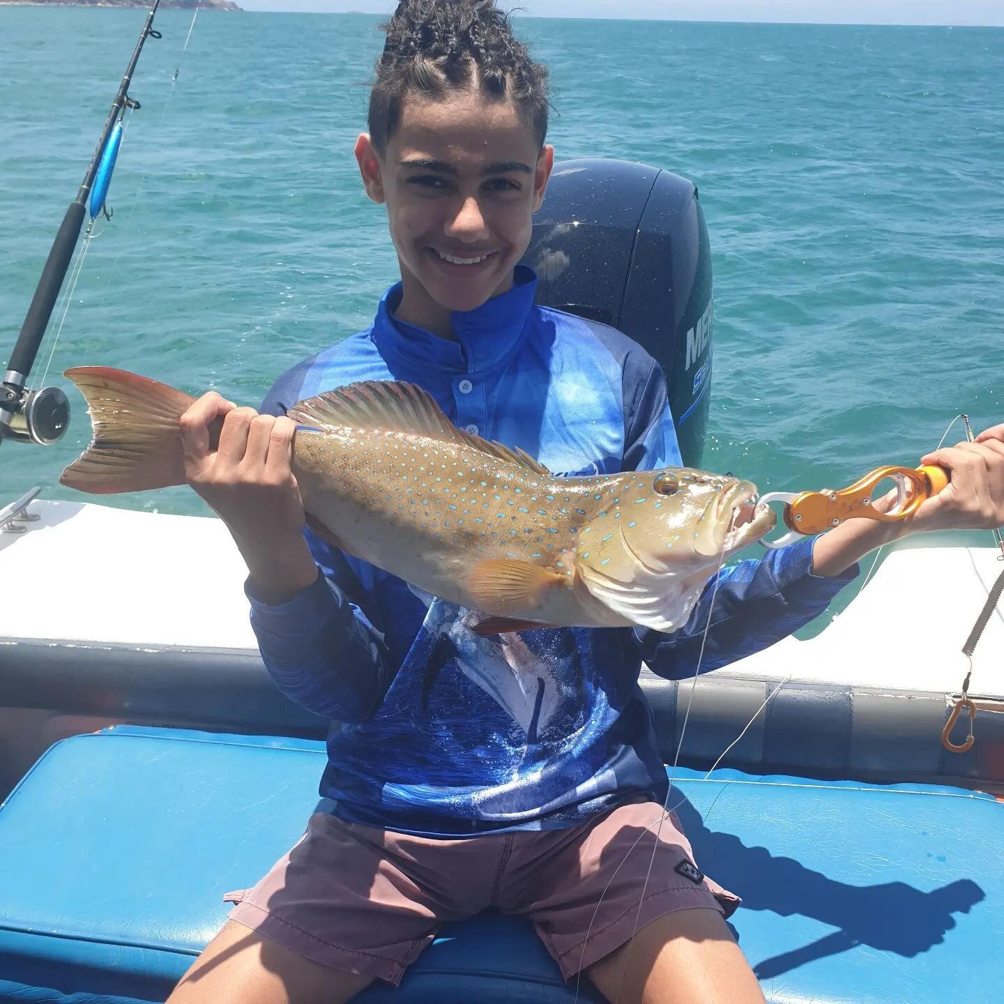 Young man with a beautiful Coral Trout caught around Magnetic Island. 
www.magneticislandfishingcharters.com.au