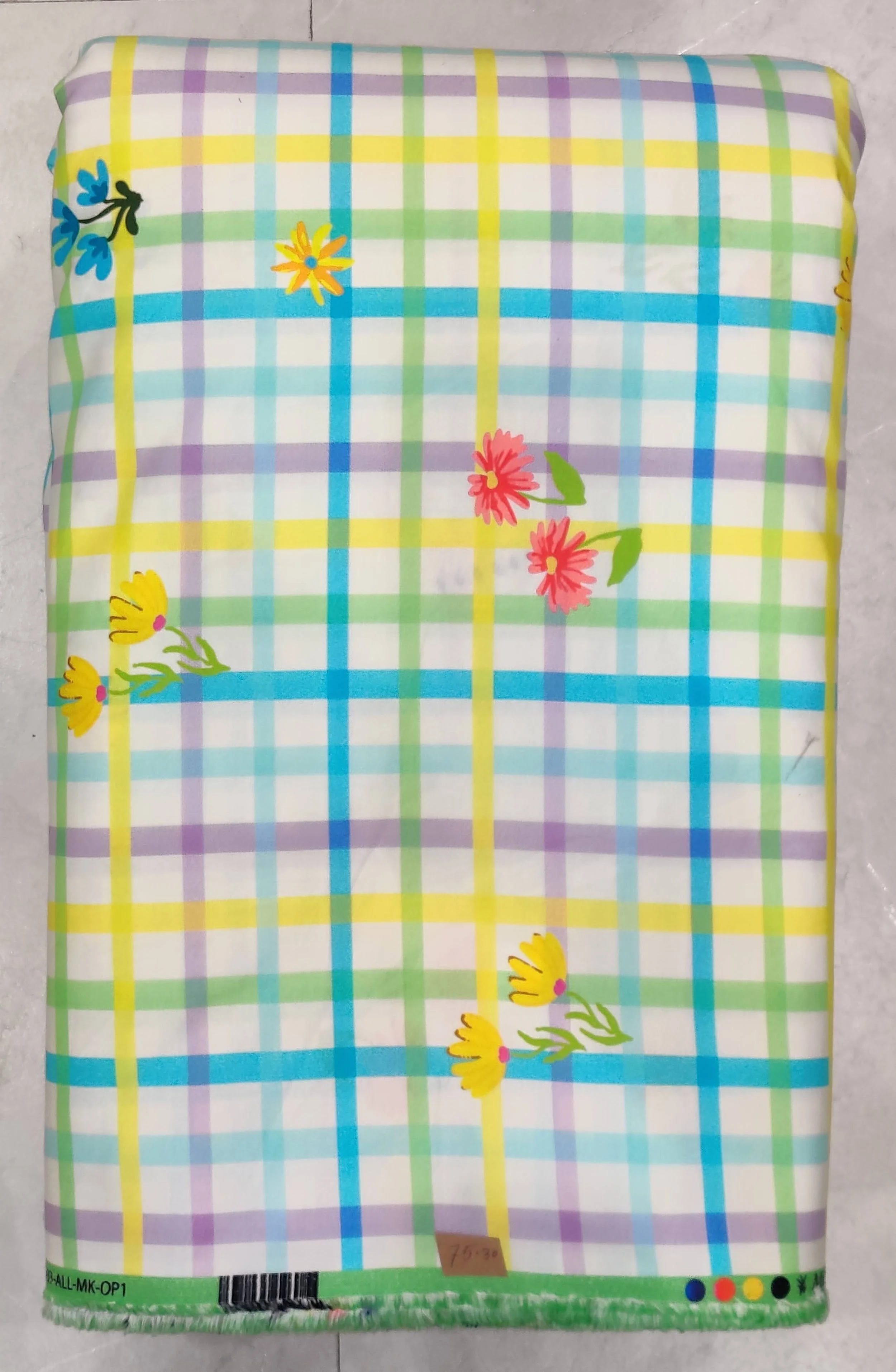 Light turquoise background featuring a traditional, ornate ethnic print with repeating medallion motifs, intricate geometric borders, and fine botanical details.