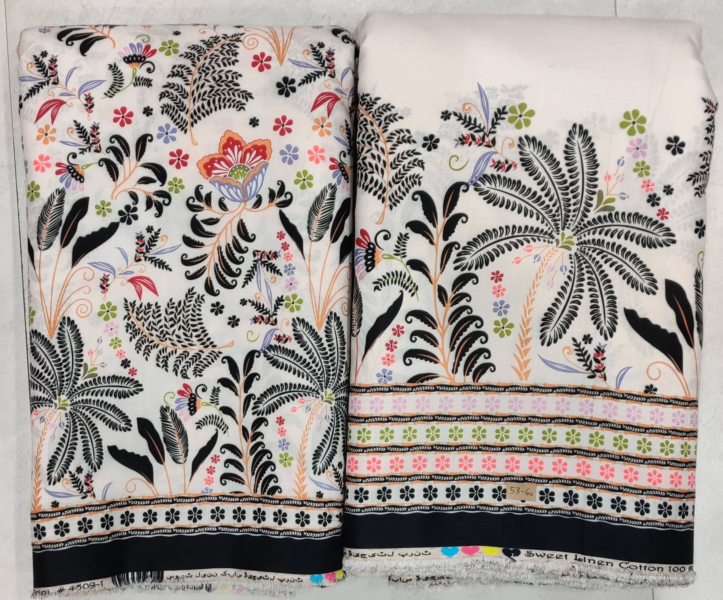 Serene ivory and soft lavender fabric featuring delicate blooming lotus flowers and tranquil water lilies resting upon gentle, flowing ripple-patterned waves along an aquatic border layout.