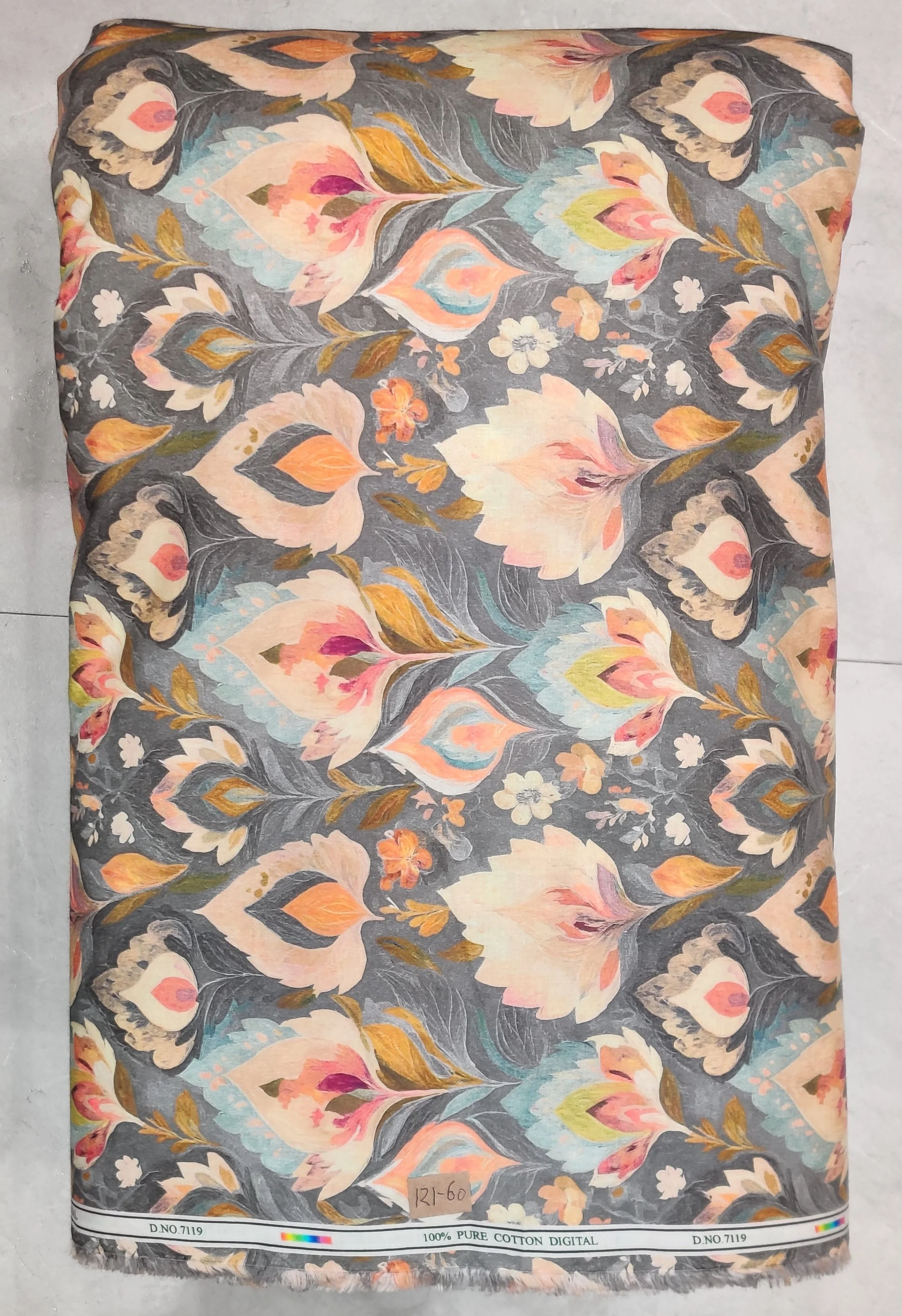 Muted grey-blue base featuring an ornate, folk-art-inspired paisley and floral print in warm beige, soft orange, and cream tones.