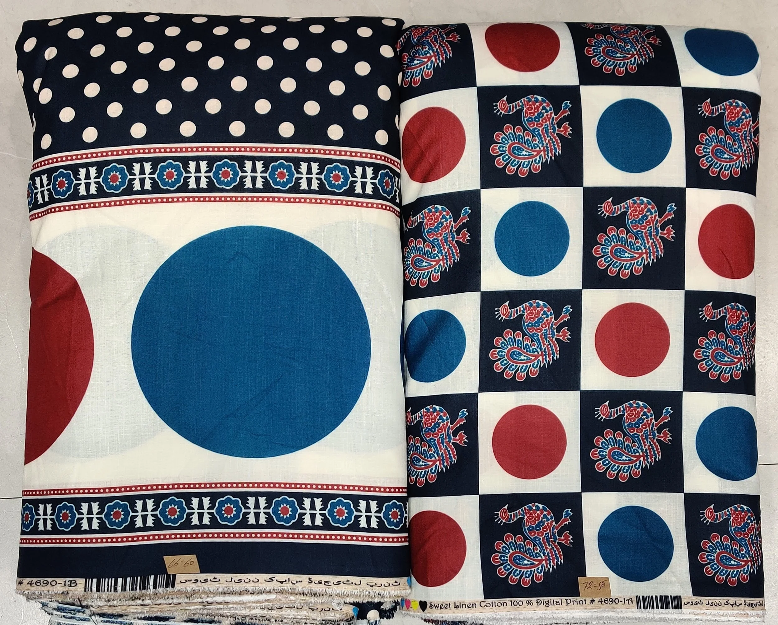 Crisp navy-blue and snow-white fabric featuring an artful maritime design with stylized flying sea birds along the top, detailed swimming fish along the bottom, and a scalloped dividing line.