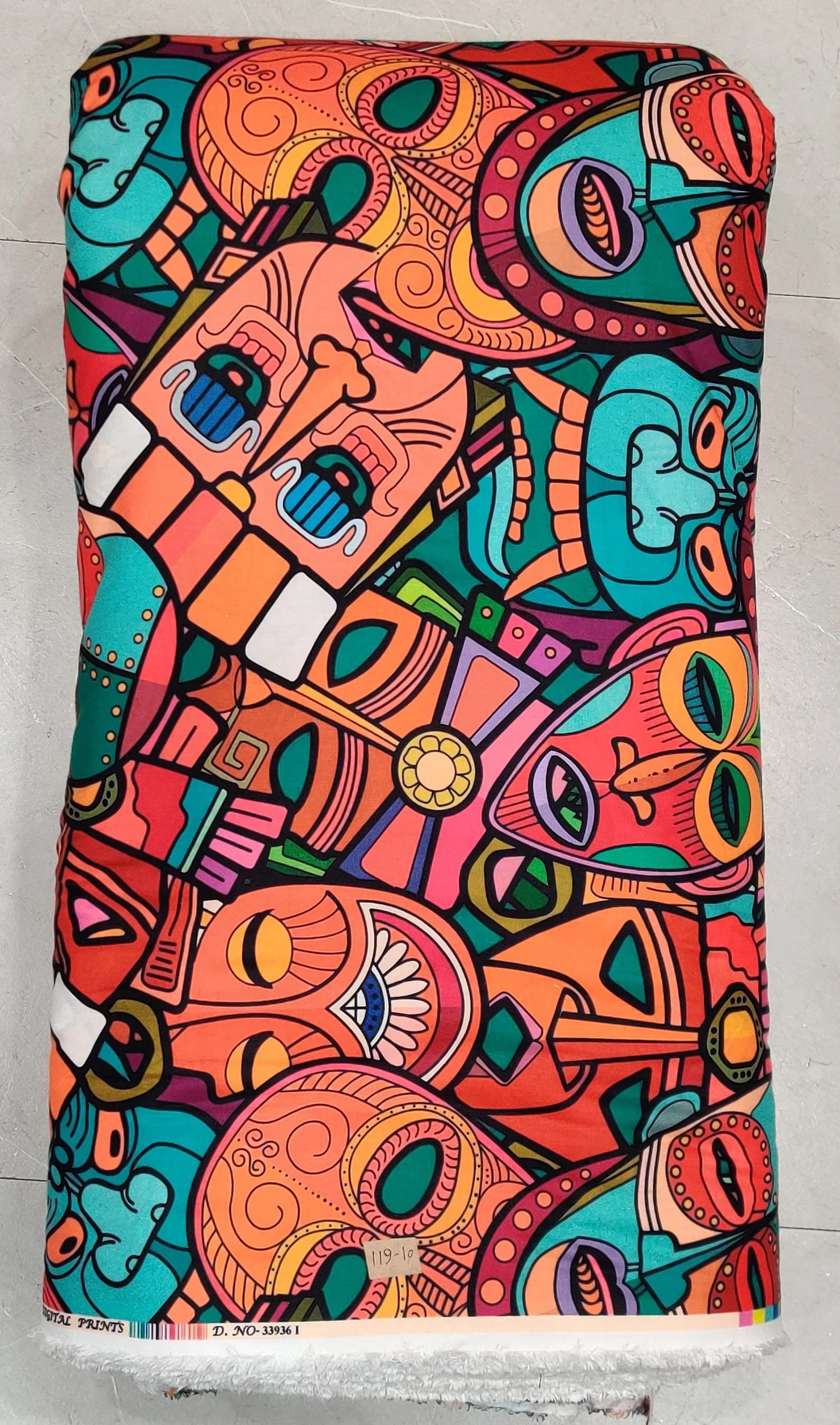 Vibrant abstract fabric featuring an expressive pop-art style design with stylized faces, bold geometric shapes, and rich golden-yellow, blue, and black tones.
