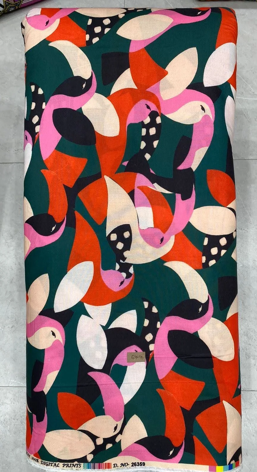Deep navy-blue fabric featuring a dense print of stylized white toucans and tropical foliage.