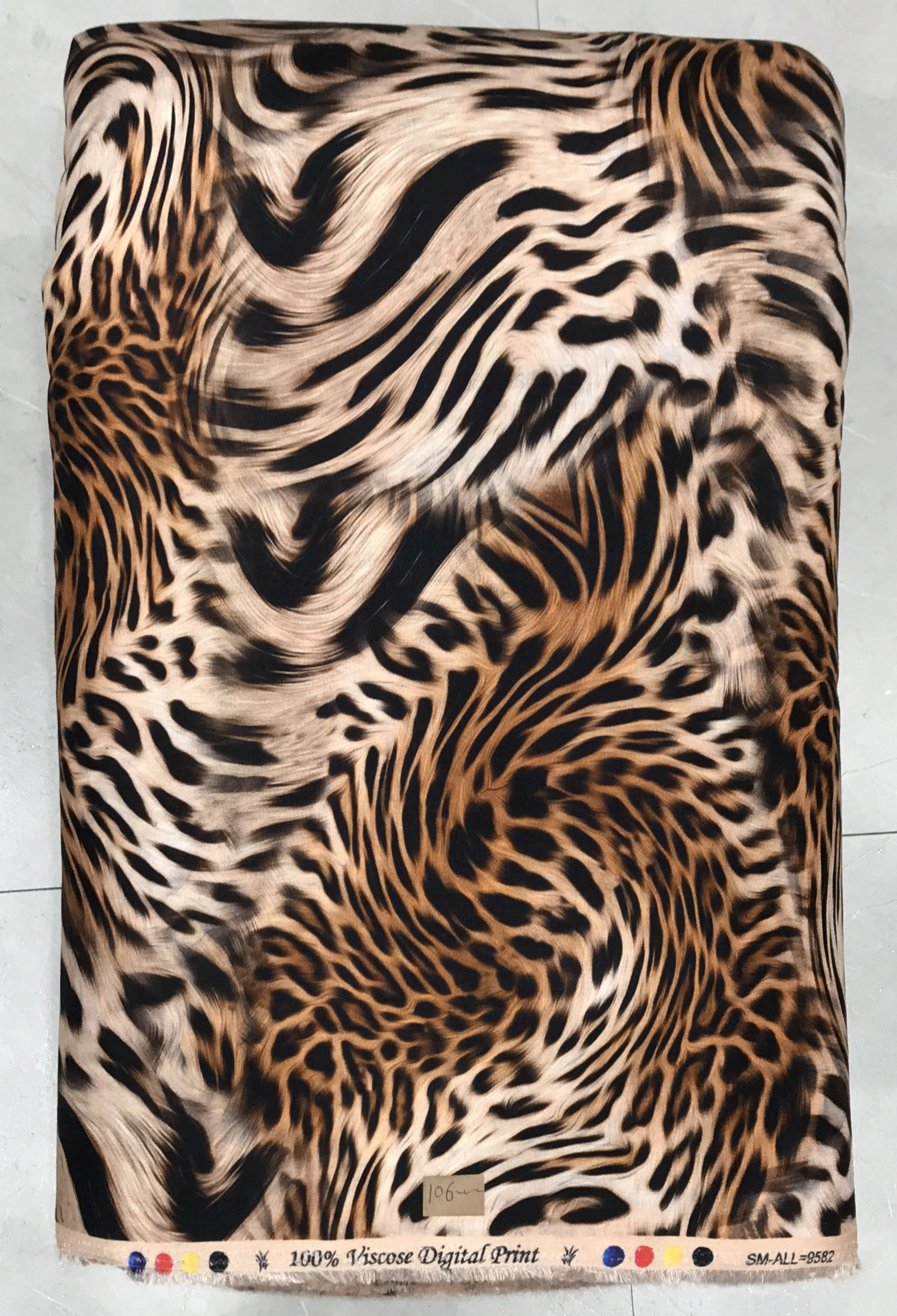 Rich espresso-brown and golden-amber canvas featuring an intricate animal-skin pattern with detailed leopard spots, contrasting markings, and fine textured borders.