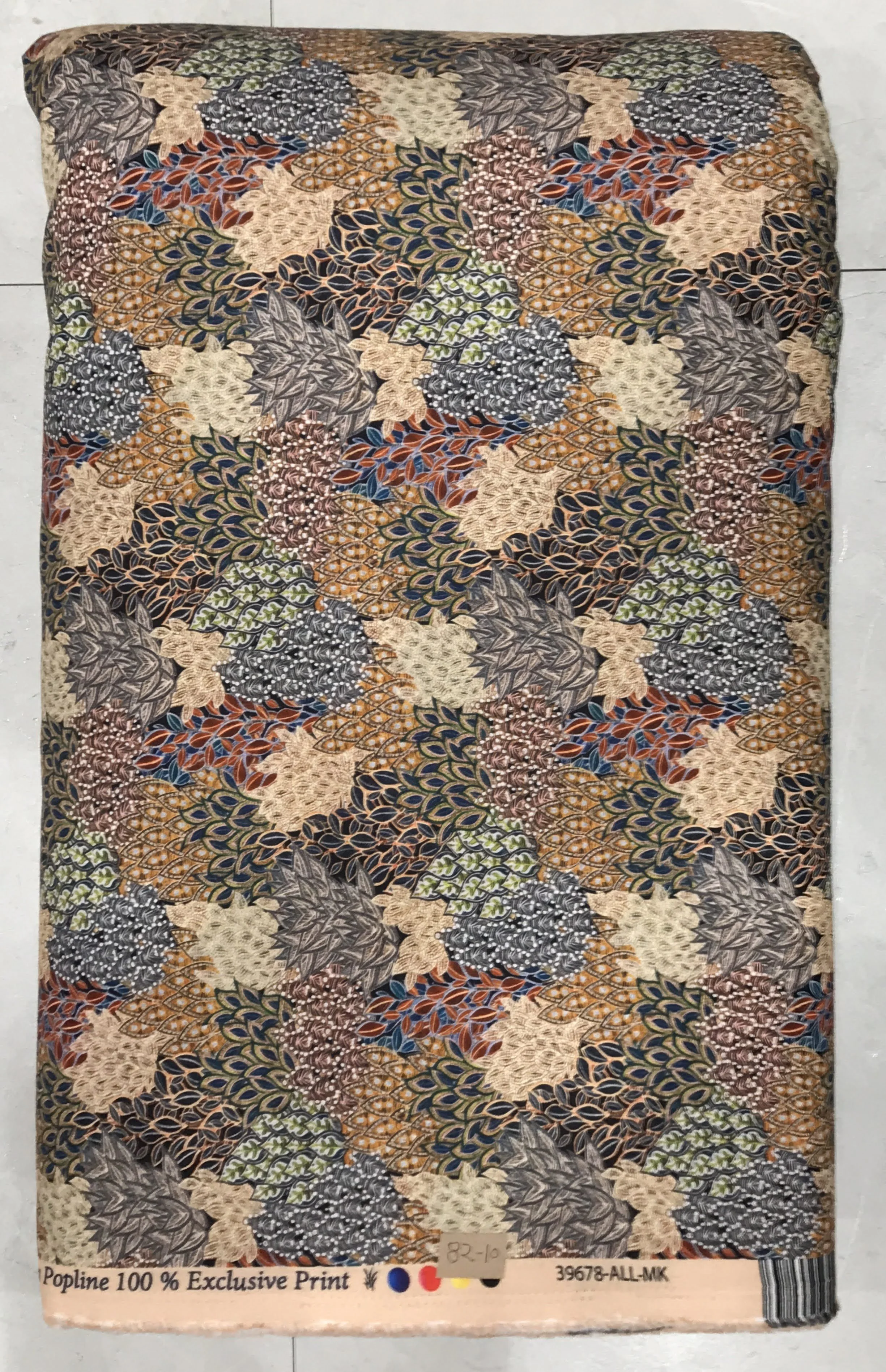 Deep charcoal black background featuring a dense, vibrant medley of multicolored botanical blooms and intricate small-scale patterns.