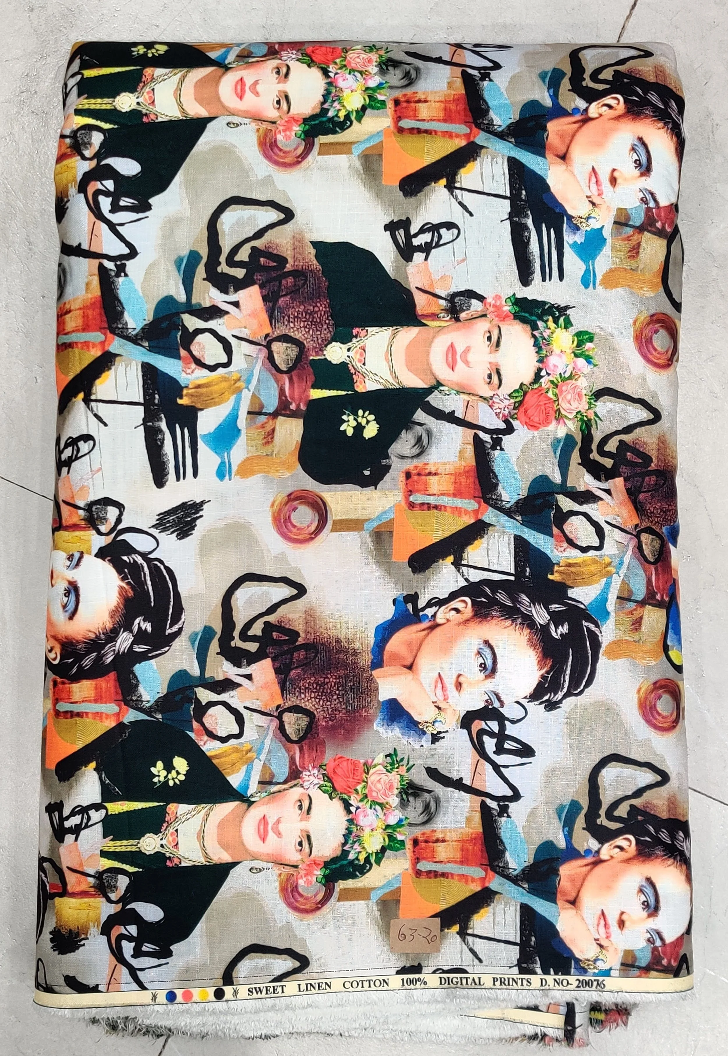 Eclectic multi-colored artistic print featuring a collage of quirky pop-culture portraits, vibrant illustrations, and bold abstract motifs across the fabric.