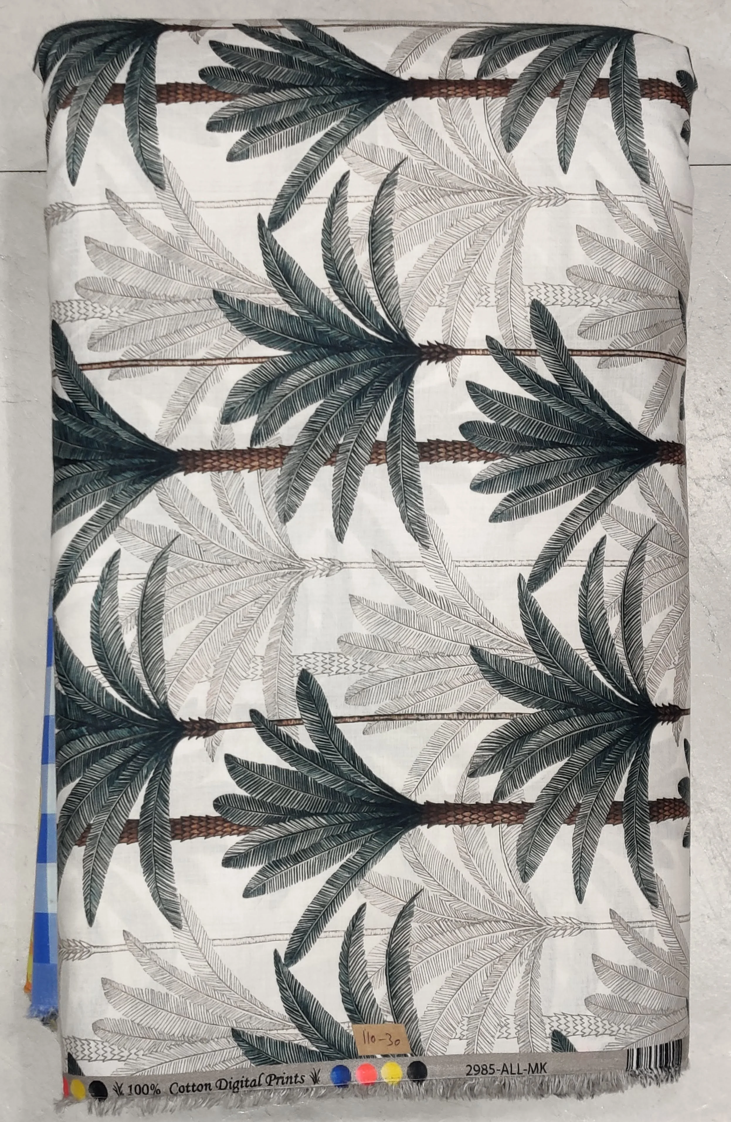Monochromatic black and grey tropical palm print on a crisp white base, perfect for crafting relaxed resort wear and contemporary summer shirts.