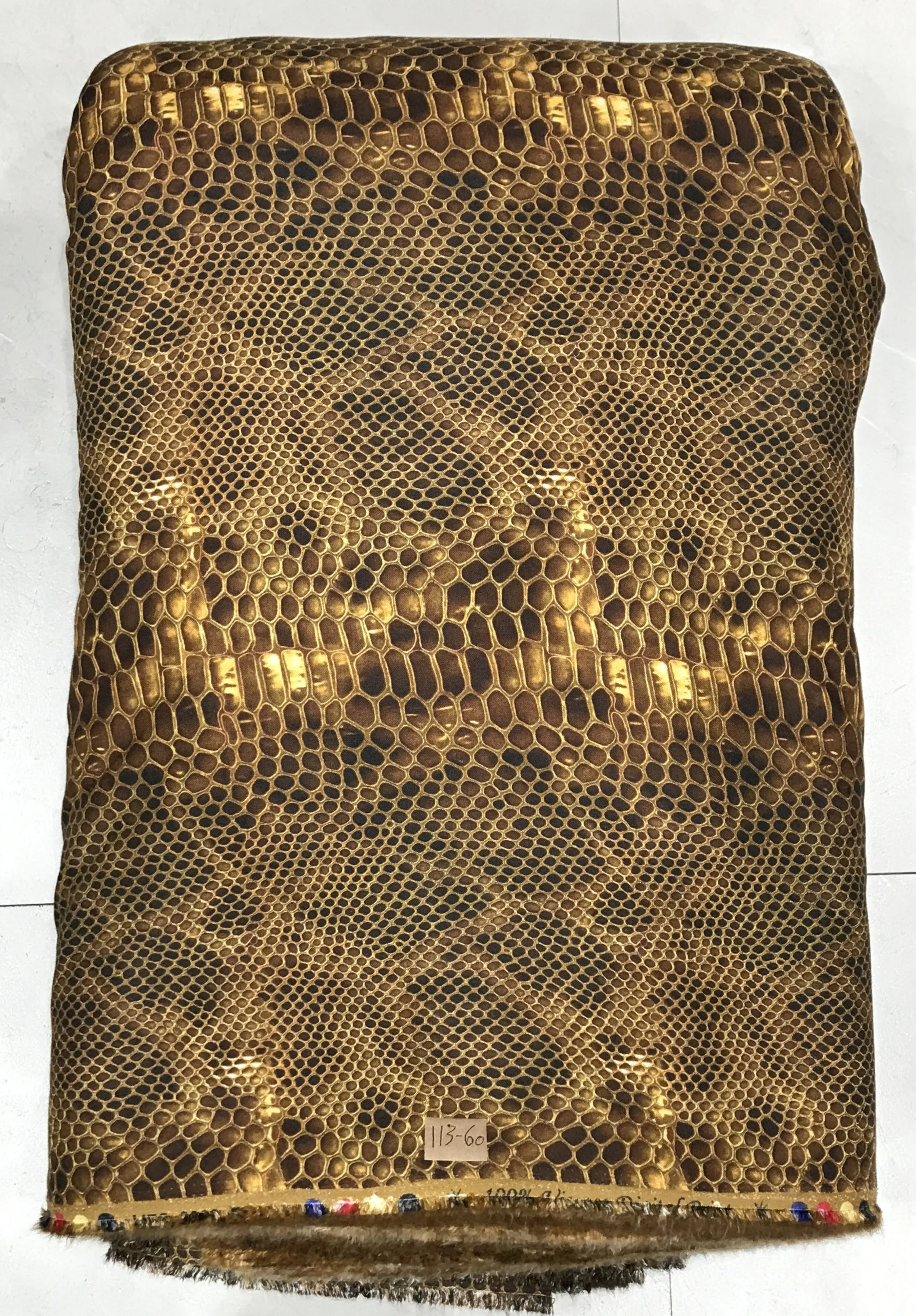 Rich chocolate-brown and golden-amber canvas featuring an intricate animal-skin pattern with detailed leopard spots, contrasting markings, and fine textured borders.