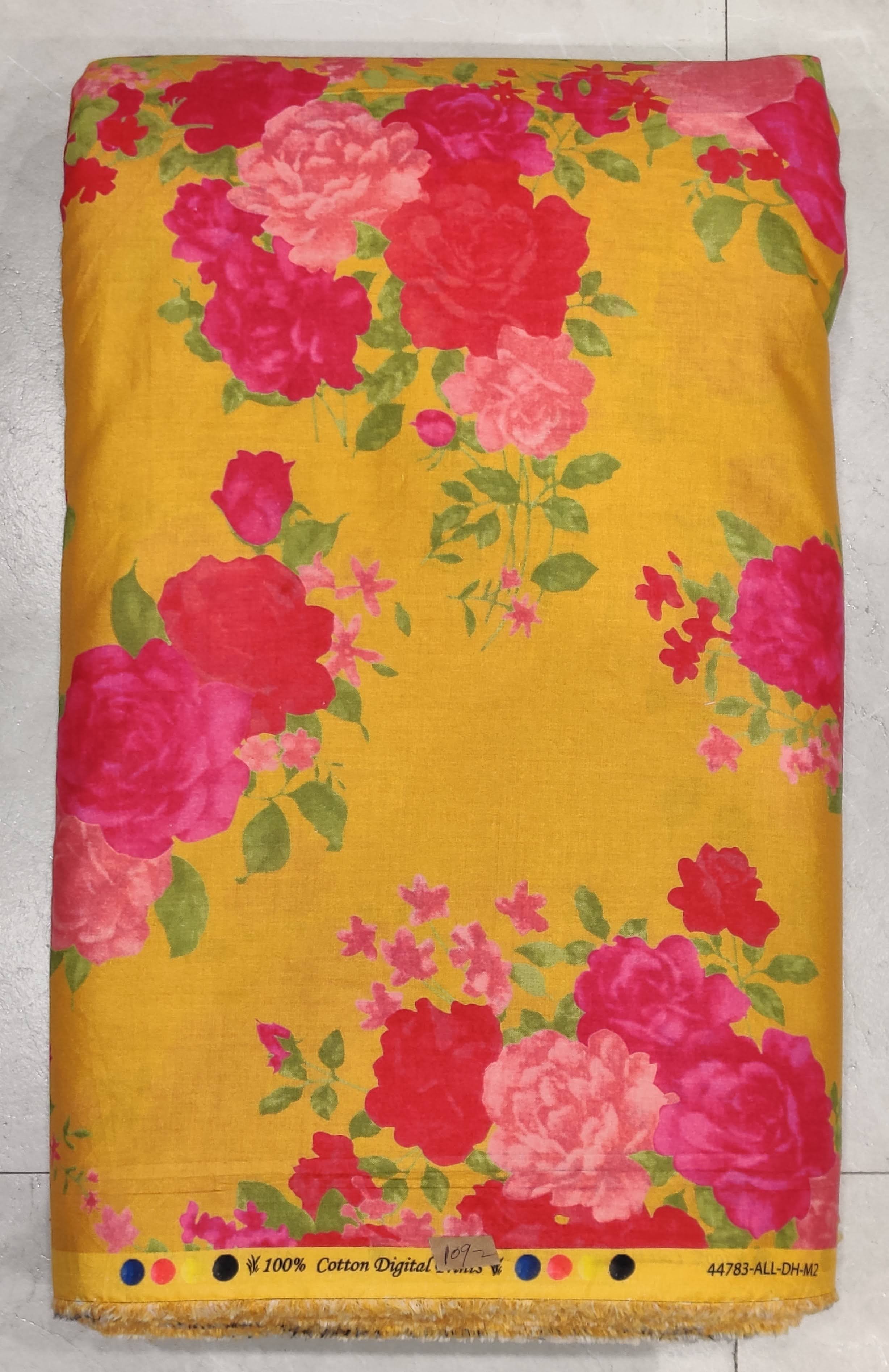 Vibrant yellow floral print featuring bold pink roses, perfect for crafting elegant ethnic kurtis and breezy summer dresses.