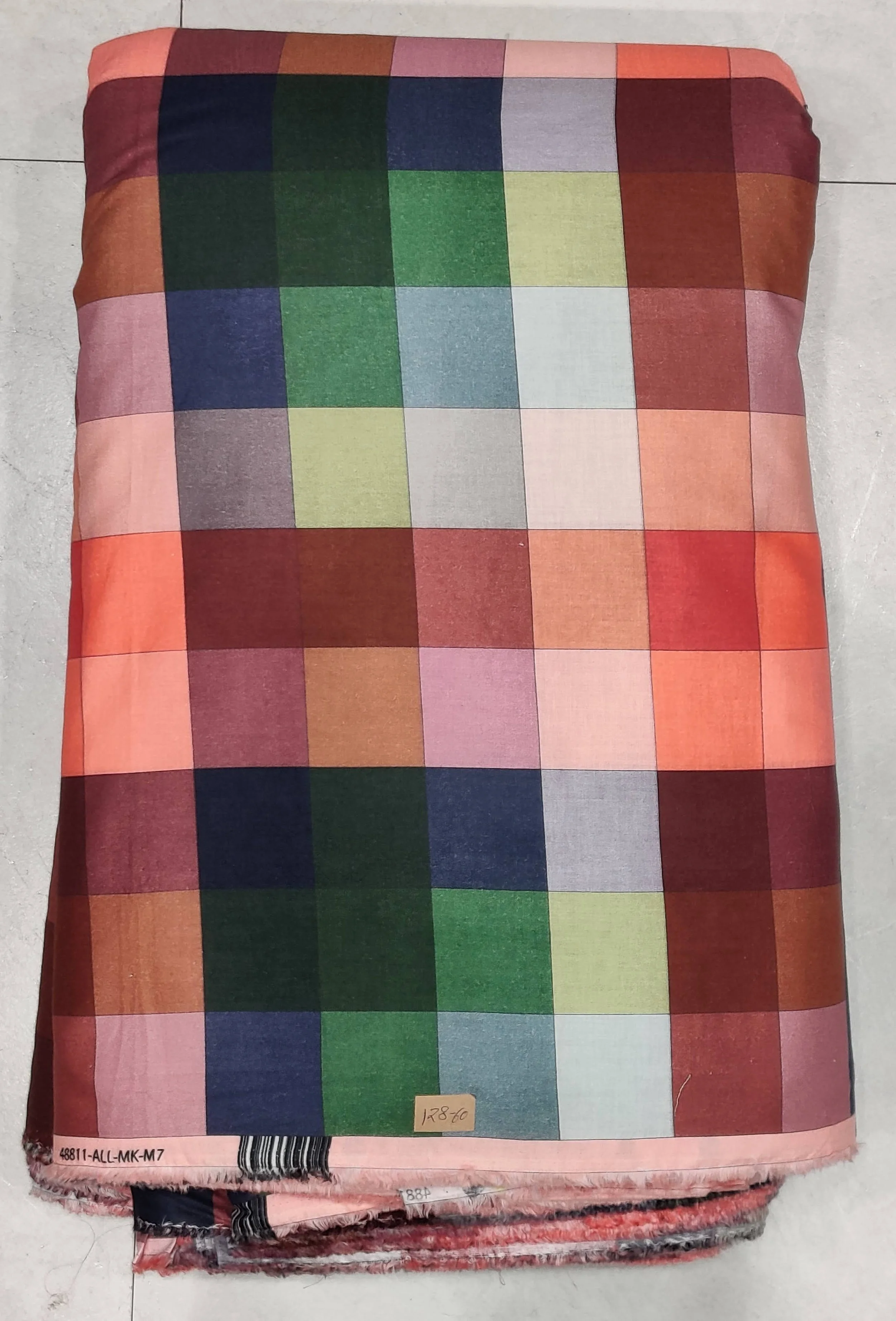 Classic multi-color plaid print featuring red, navy, and green tones, perfect for crafting cozy casual shirts and everyday contemporary wear.