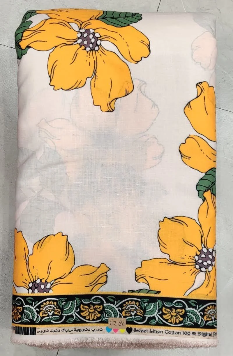 Rich moss-green and bright citrus-lime modal-cotton fabric featuring an all-over intricate floral and paisley print, finished with a contrasting ornamental border along the hem.
