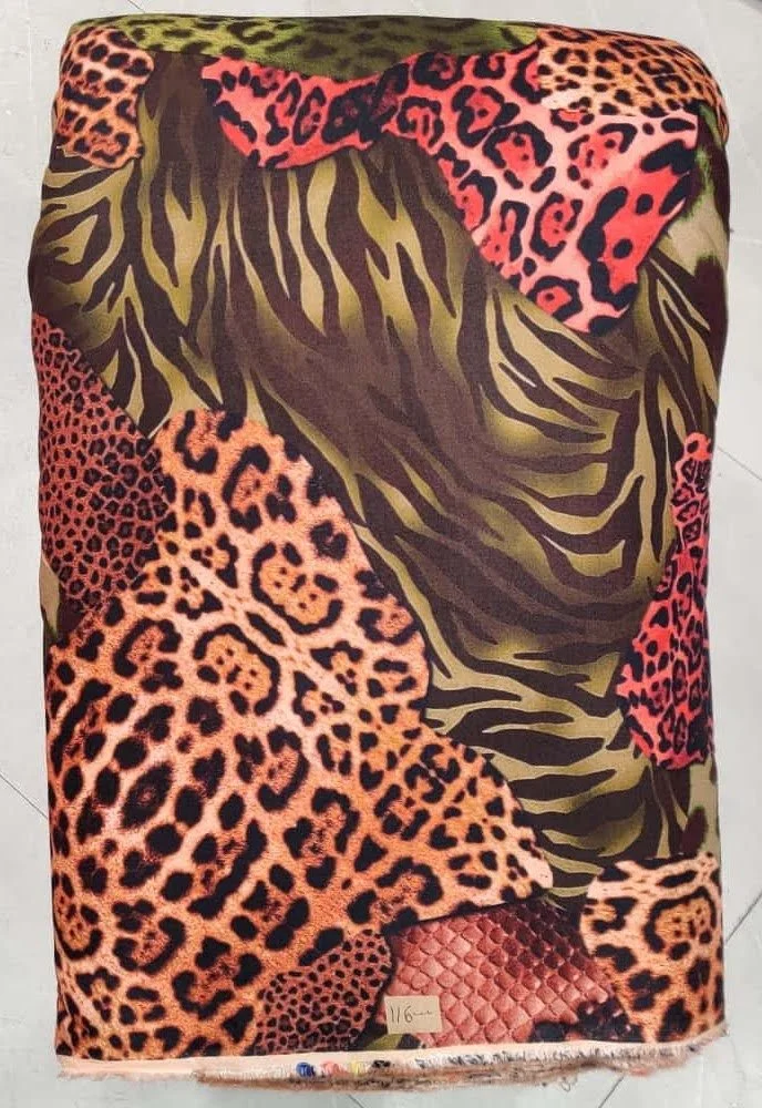 Gleaming bronze-brown and copper-amber woven textile featuring a mosaic-like animal pelt pattern composed of speckled feline patches, interlocking textures, and organic grain variations.