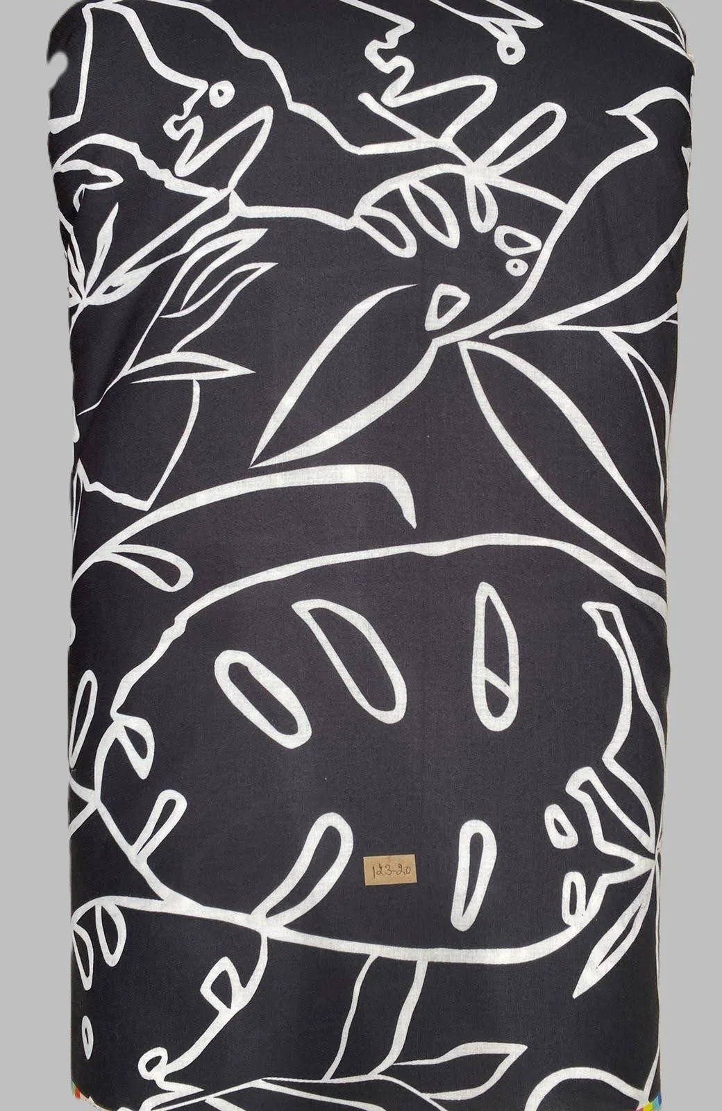 Deep navy-blue fabric featuring a dense print of stylized white toucans and tropical foliage.