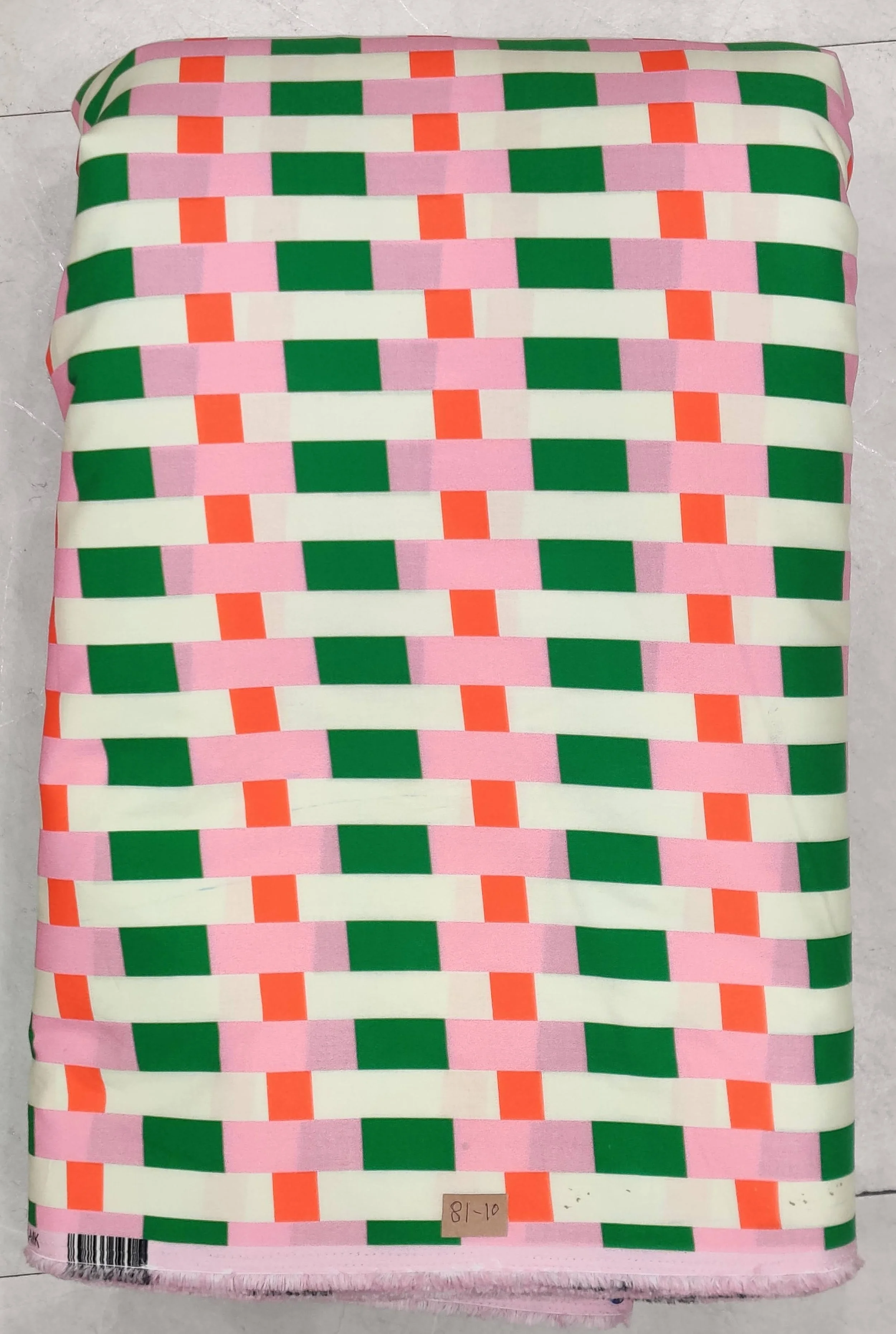 A soft, textured neutral background featuring a modern checkered lattice or grid pattern formed by alternating rows of small, crisp white squares and bold coral-pink squares with delicate dark detailing.