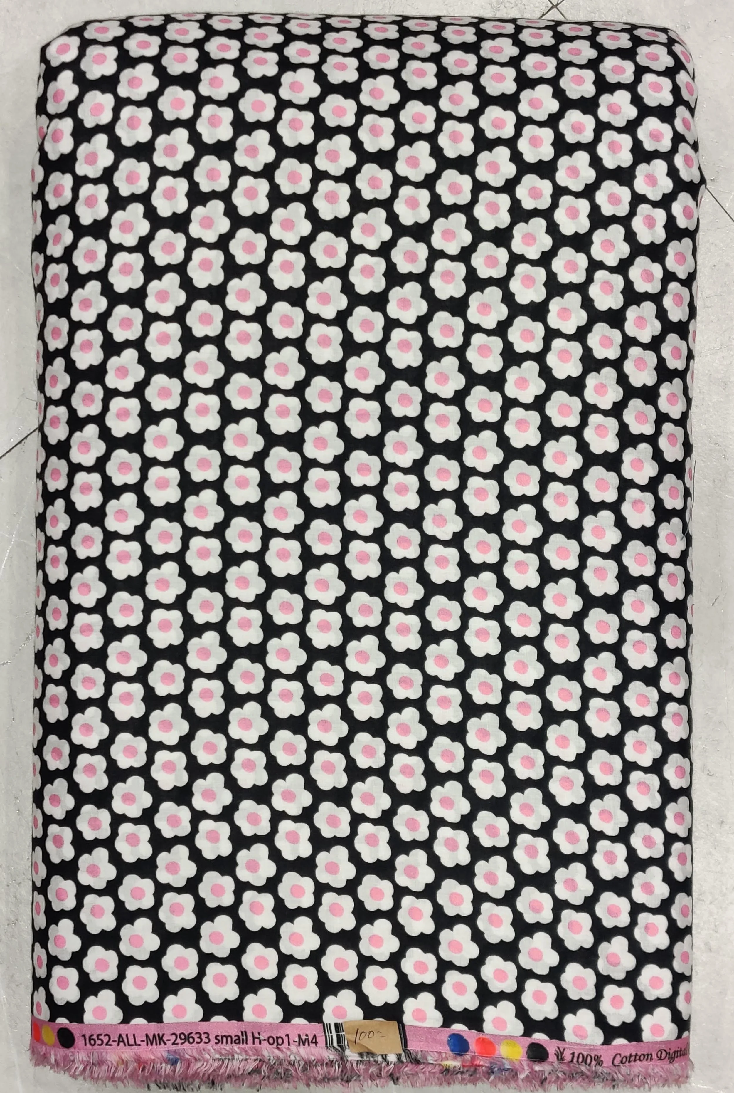 Black background featuring a tightly packed, small-scale white geometric honeycomb pattern.