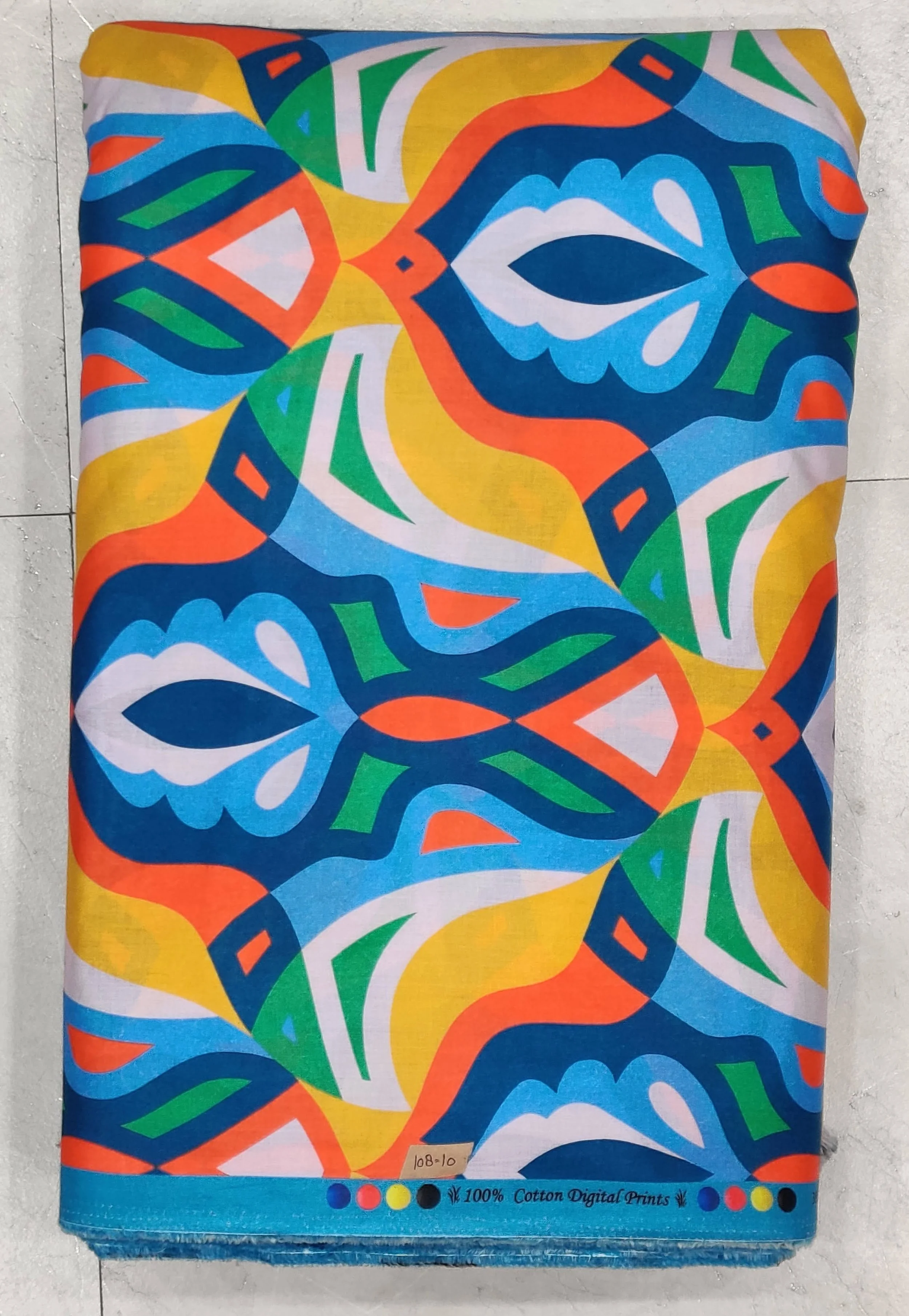 Vibrant blue, yellow, and orange abstract geometric print, perfect for crafting statement shirts and contemporary summer dresses.