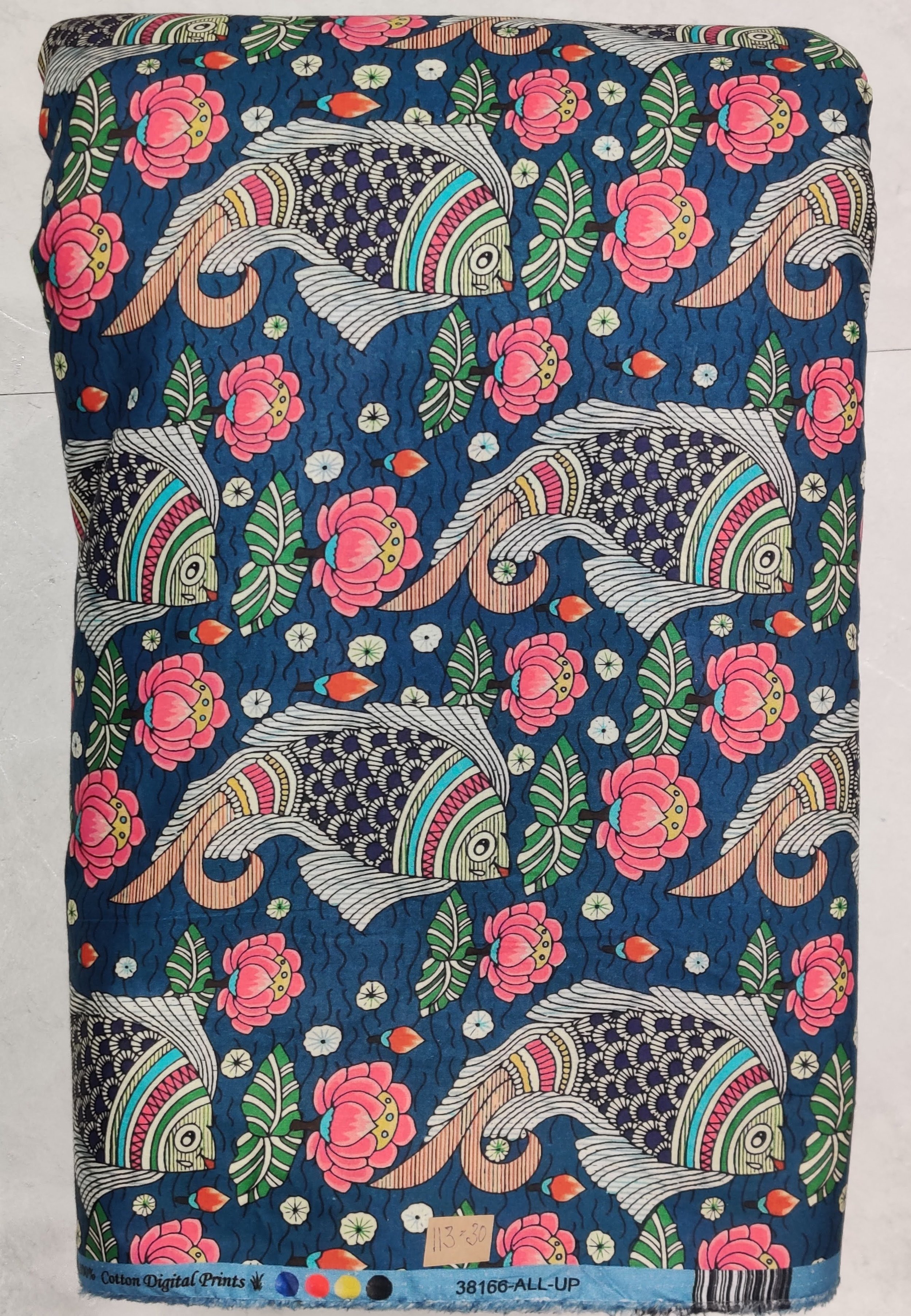 Navy blue background featuring traditional, intricately patterned elephant motifs surrounded by vibrant pink flowers and green foliage.