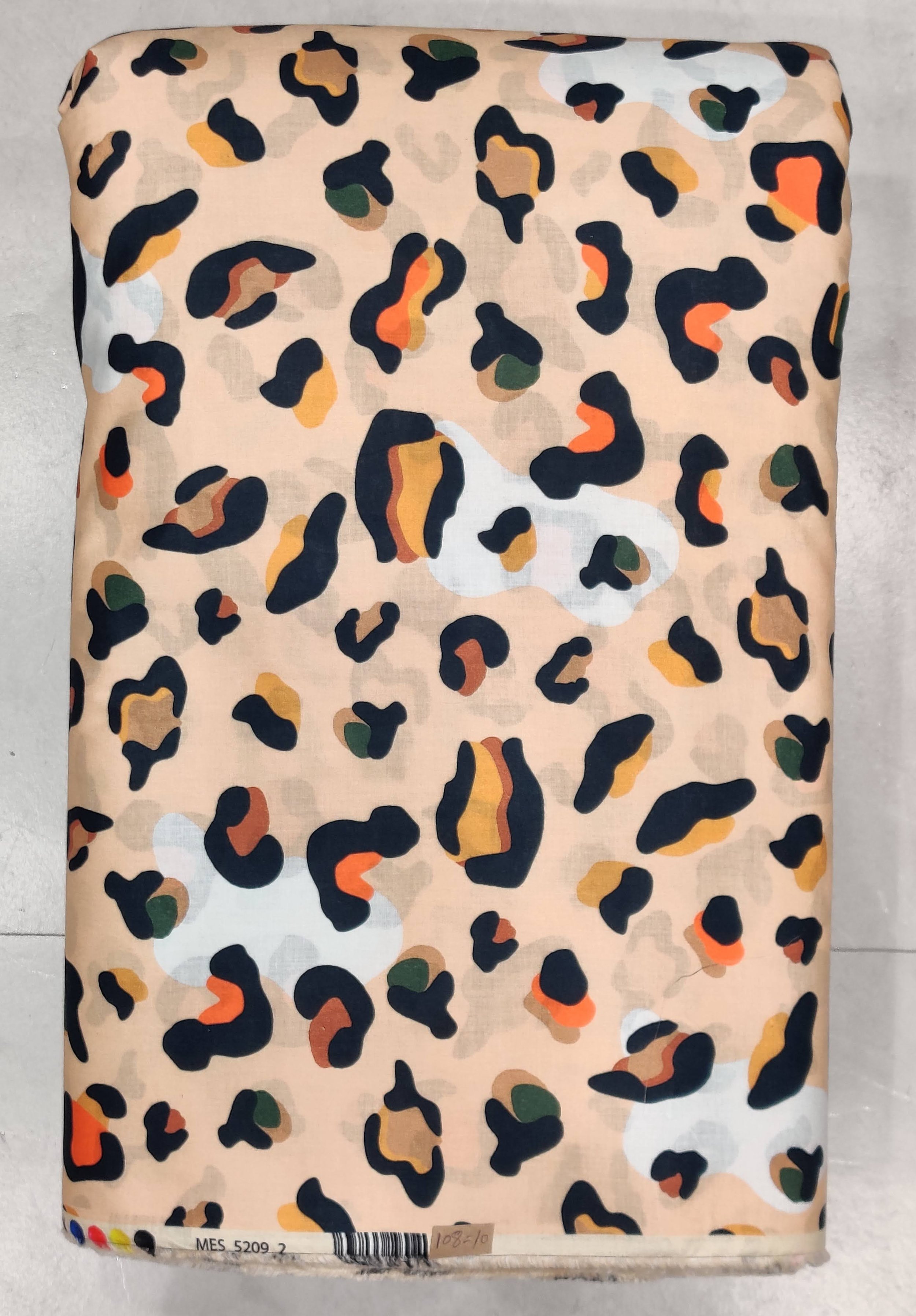 Classic tan and black leopard print, perfect for crafting bold statement tops and chic contemporary dresses.