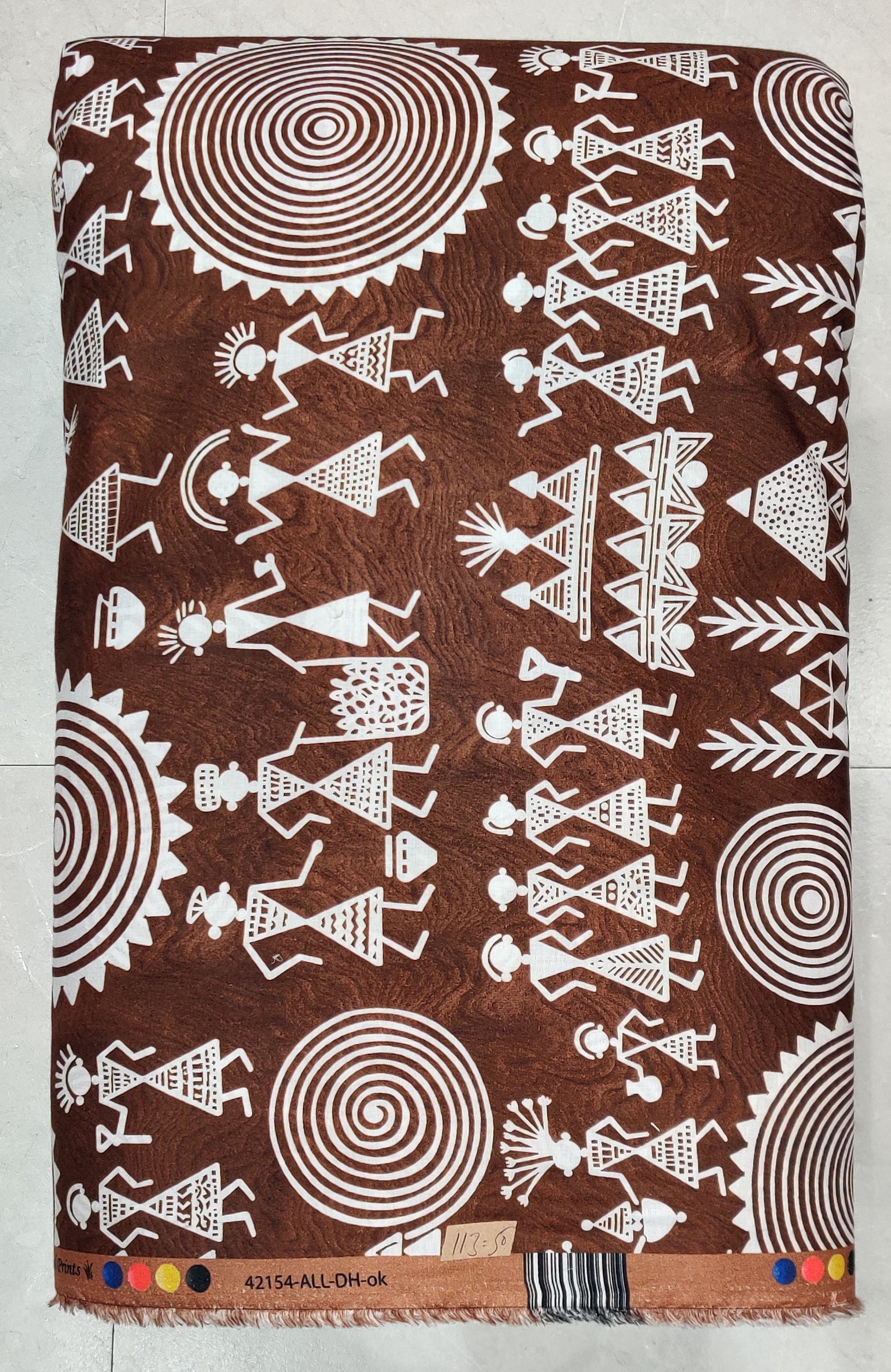 Earthy brown and white Warli tribal print, ideal for crafting authentic ethnic kurtis and bohemian dresses.
