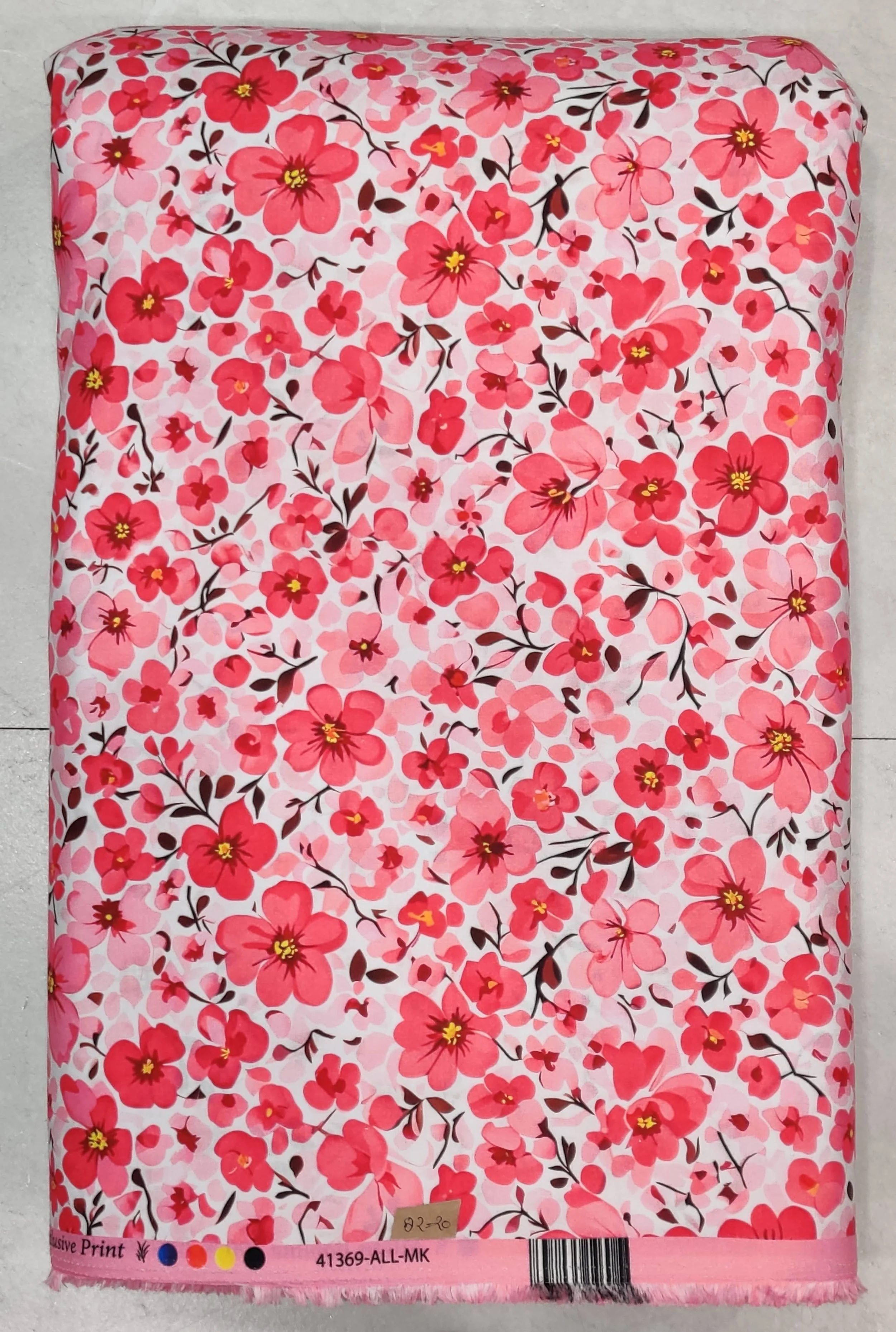 Vibrant coral-pink and white background featuring a dense, delicate pattern of small floral sprigs and tiny leafy blossoms arranged in a soft, continuous layout.