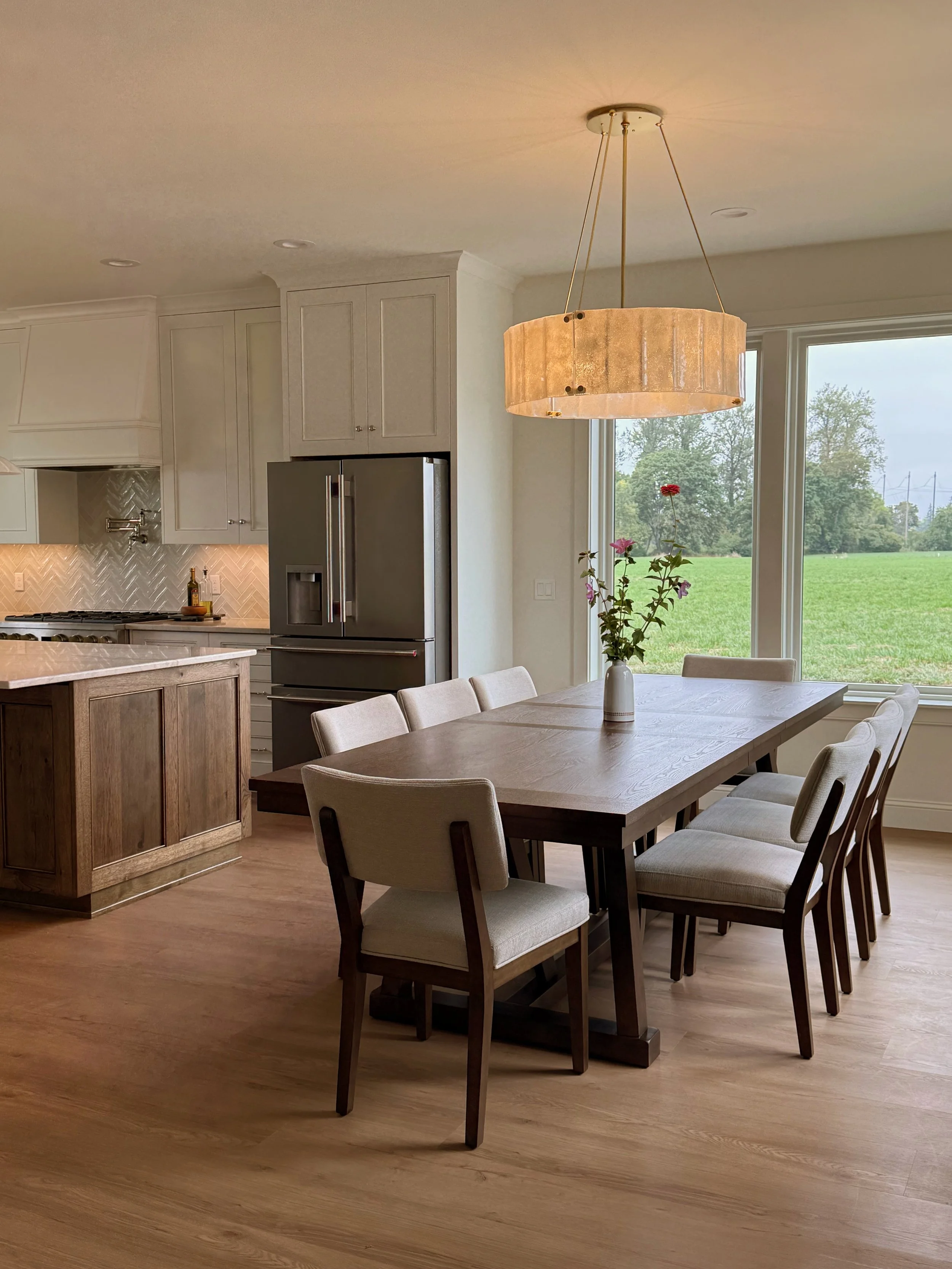 the heart of the home &mdash; big table, big light (a favorite of mine), big views, and a big ole good time 

design by @midafternoon.studios 
build by Precision Built Structures
