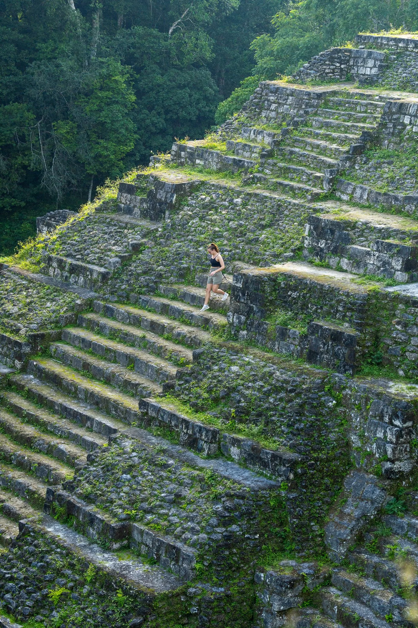 walking on ruins in Yaxha, guatemala.jpg